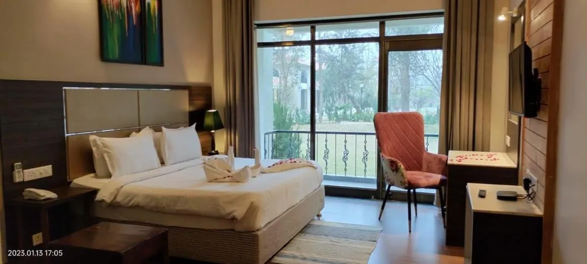 Bedroom, Bed in Riverarch Greenfields Resort