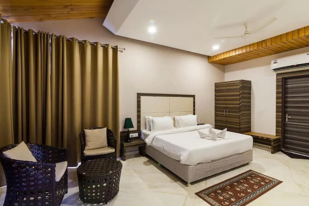 Bedroom, Bed in Riverarch Greenfields Resort