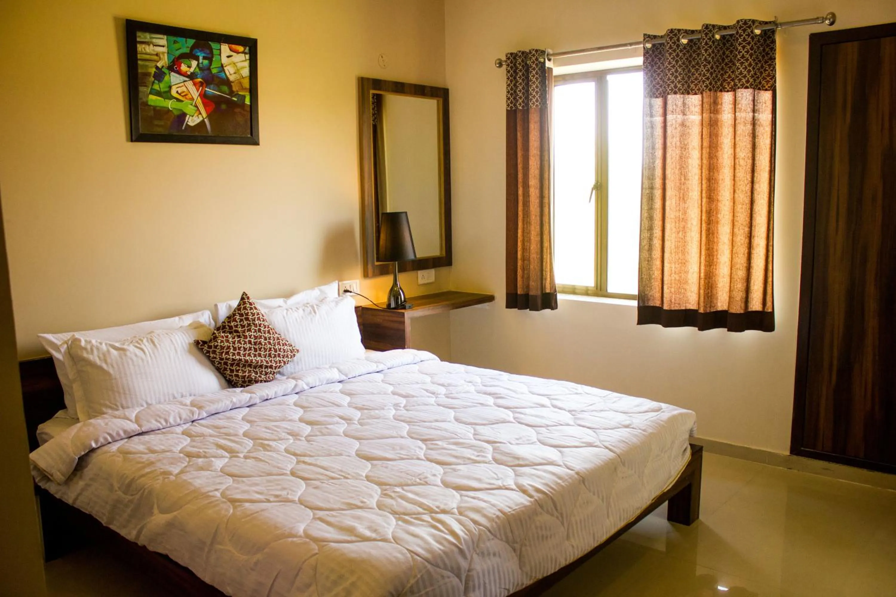 Bedroom, Bed in Riverarch Greenfields Resort