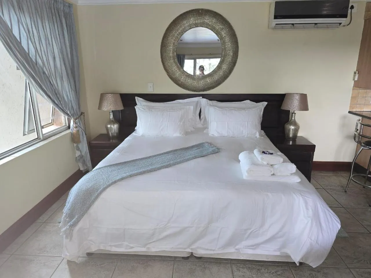 Bed in All Seasons Boutique Hotel - Sustainable Electricity and Water