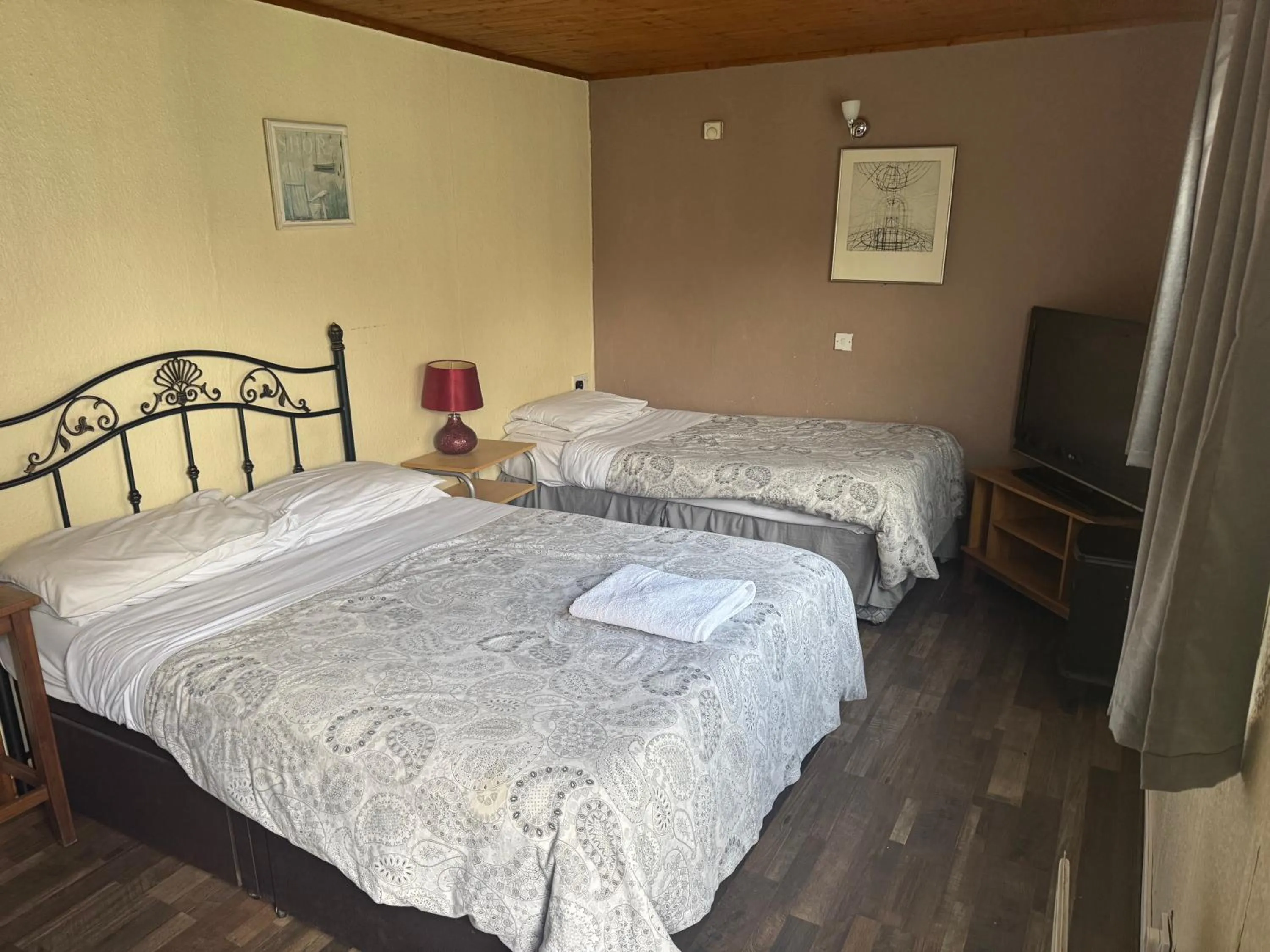 Bed in Charde Guest House