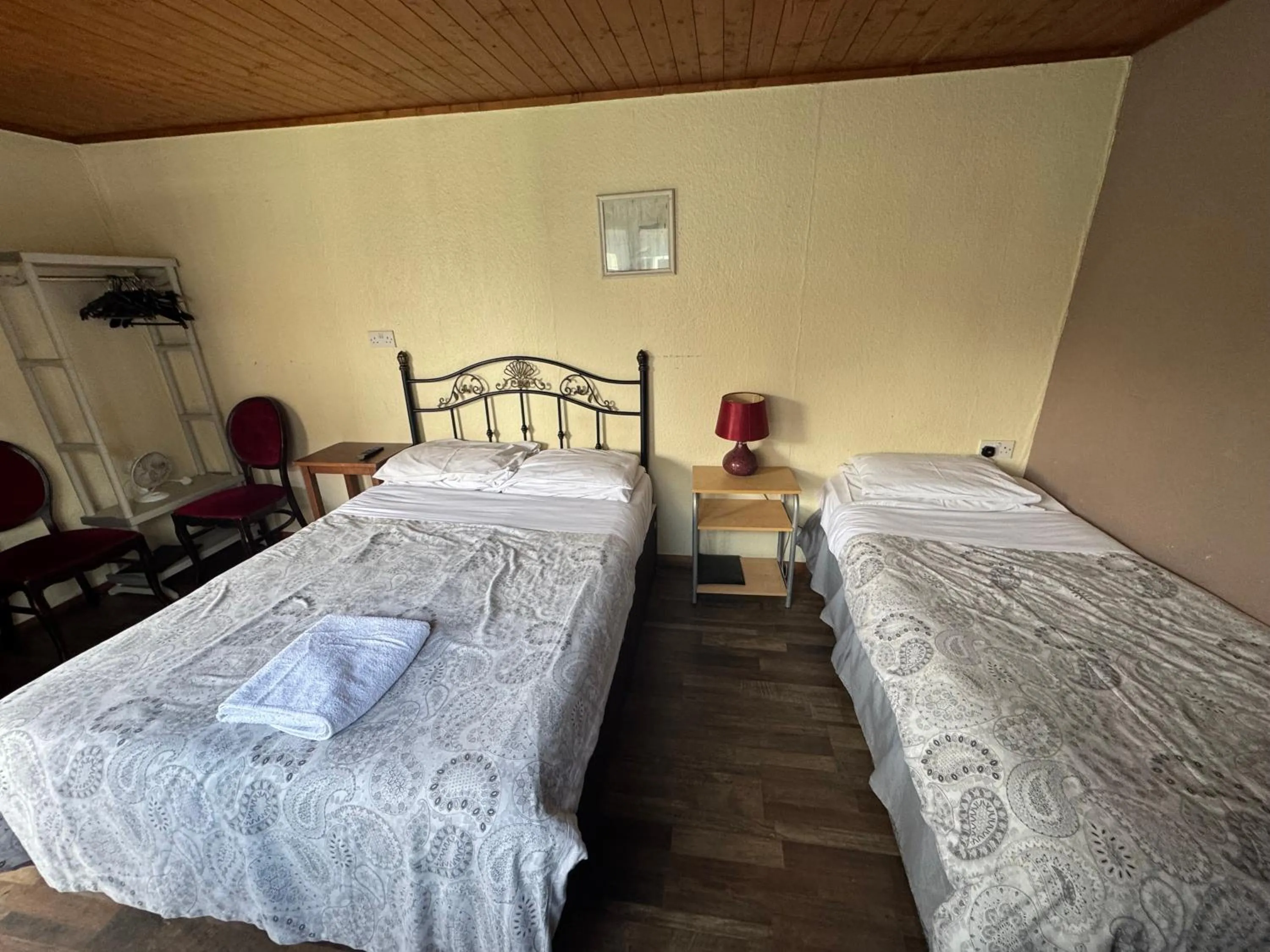 Bed in Charde Guest House