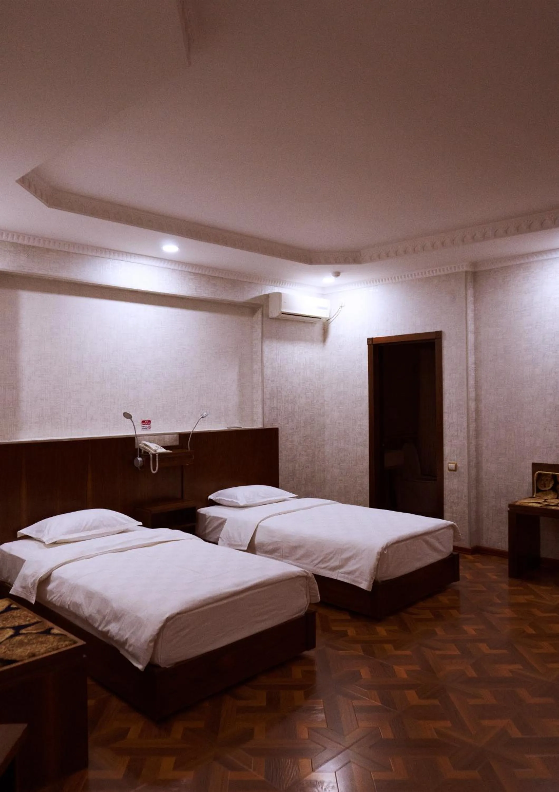 Bed in Omar Khayyam Hotel