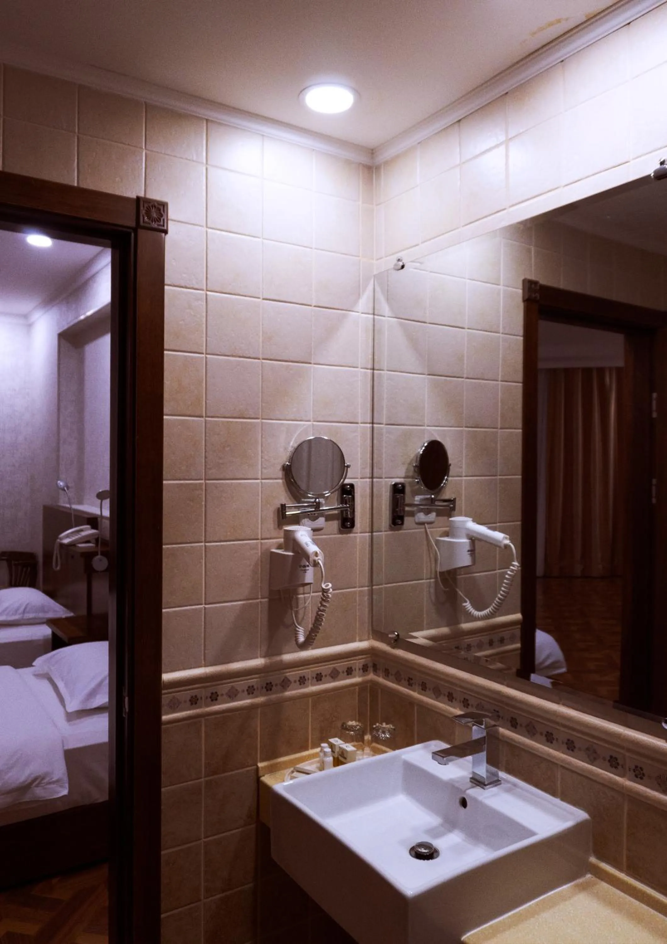 Bed in Omar Khayyam Hotel