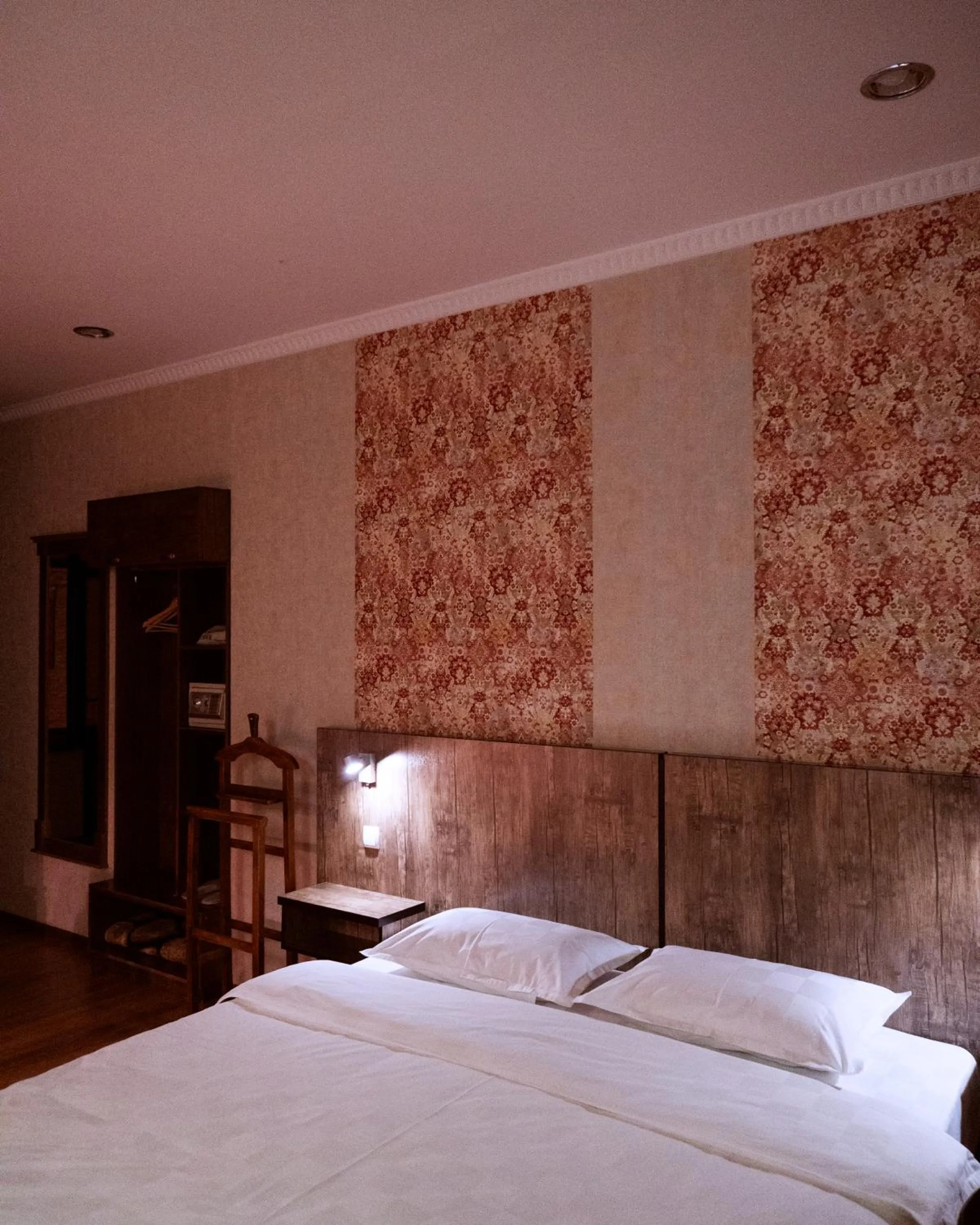 Bed in Omar Khayyam Hotel