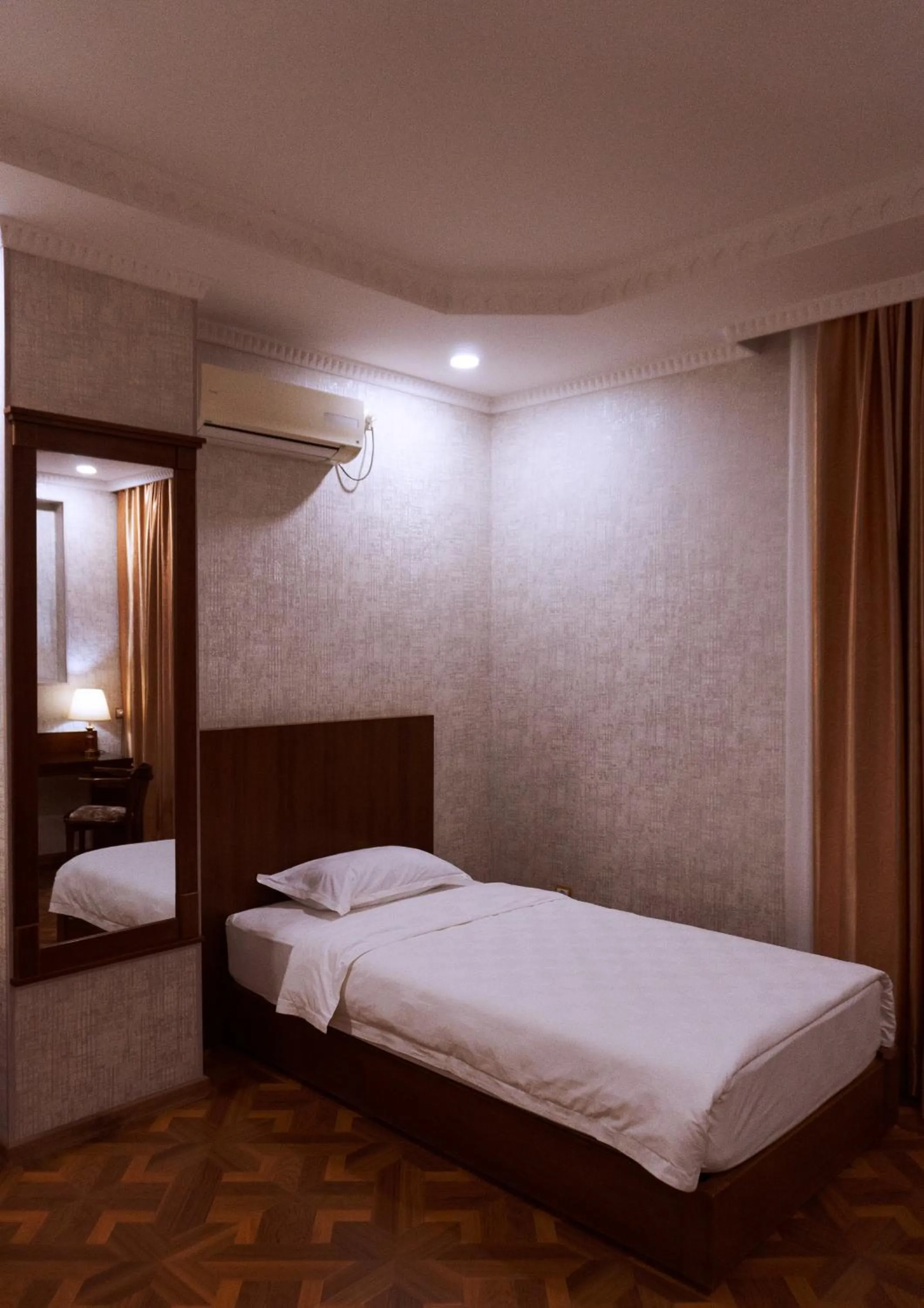 Bed in Omar Khayyam Hotel