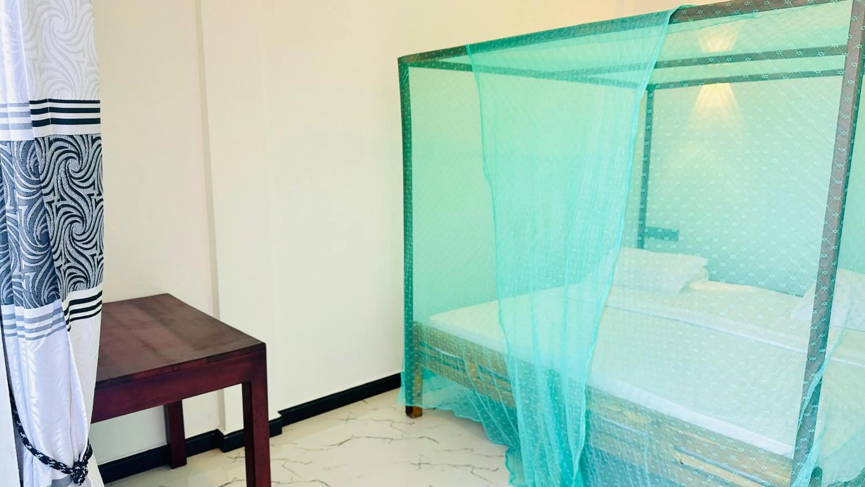 Bedroom in Garden Beach Hotel