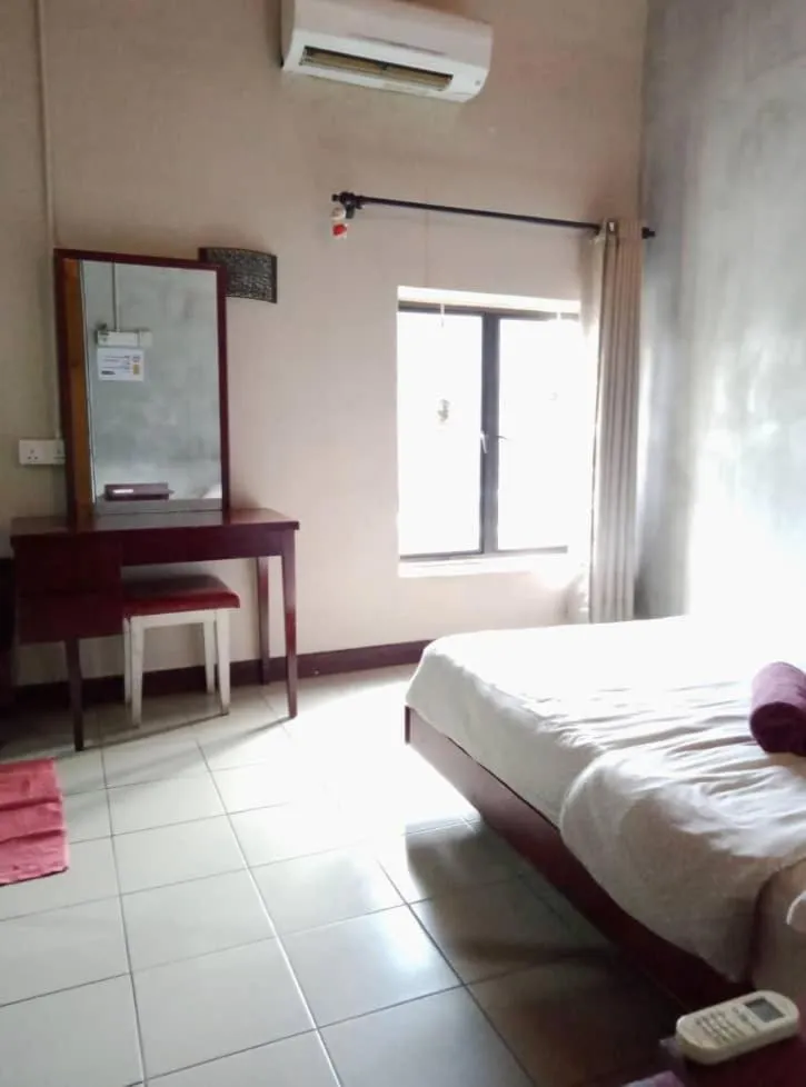 Bed in Birdnest Guesthouse, Gaia Rooftop Cafe