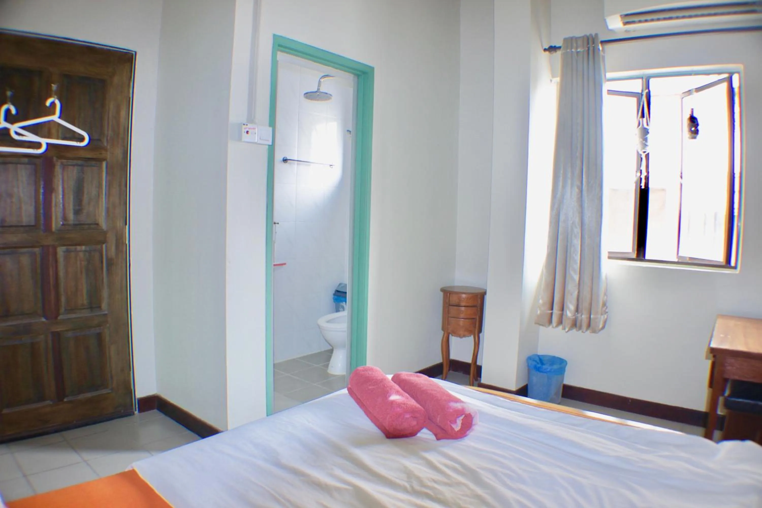 Bed in Birdnest Guesthouse, Gaia Rooftop Cafe