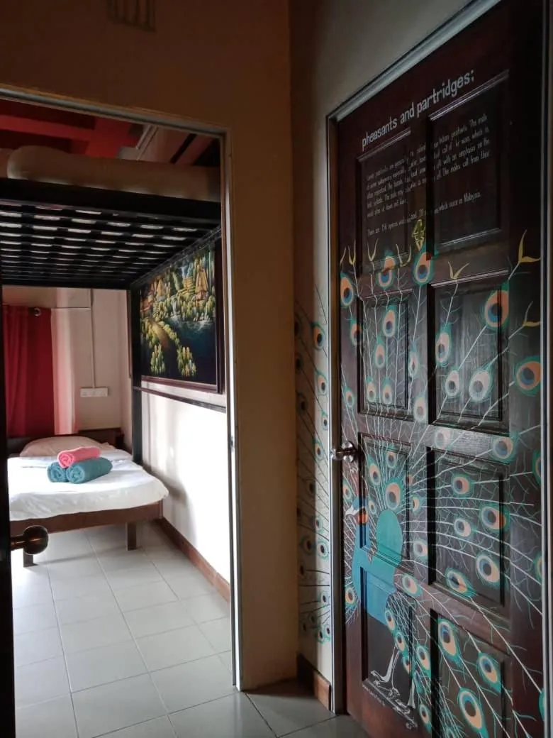 Bed in Birdnest Guesthouse, Gaia Rooftop Cafe