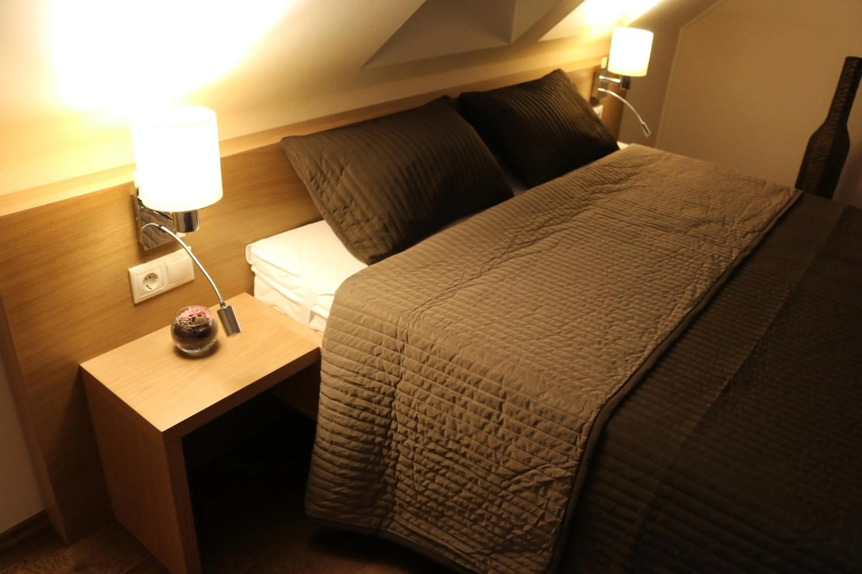 Bed in Villa Tolnay Vendégház