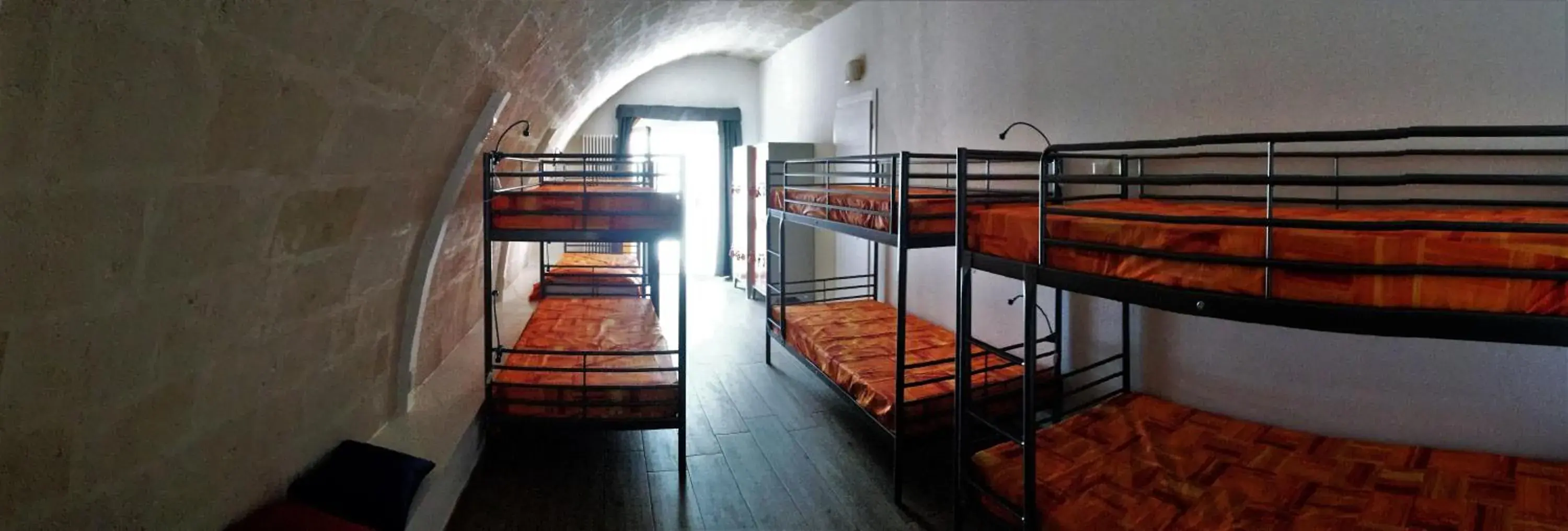 Bed in 8-Bed Male Dormitory Room in The Rock Hostel Bed in 8-Bed Male Dormitory Room in The Rock Hostel