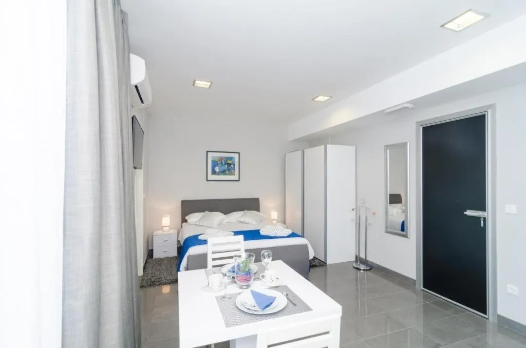 Bedroom in Apartments ZoomZoom