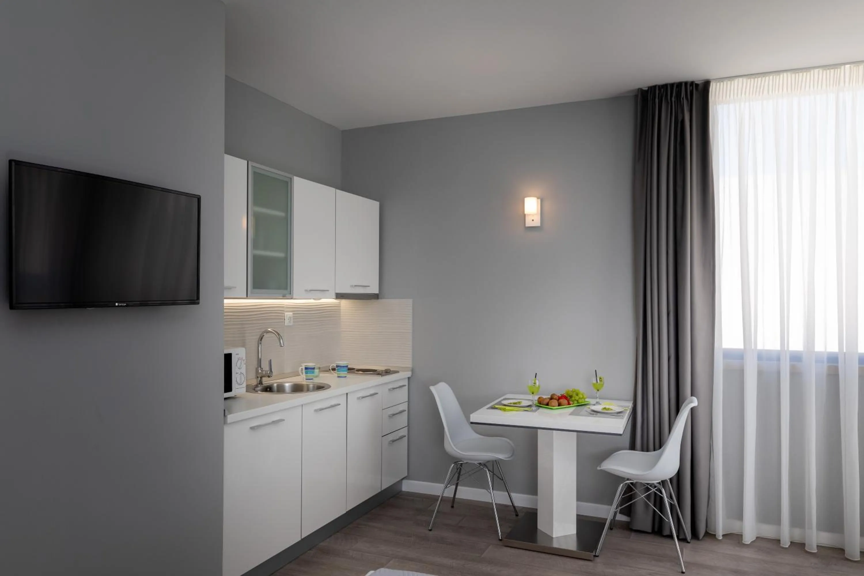 Kitchen or kitchenette in Apartments ZoomZoom