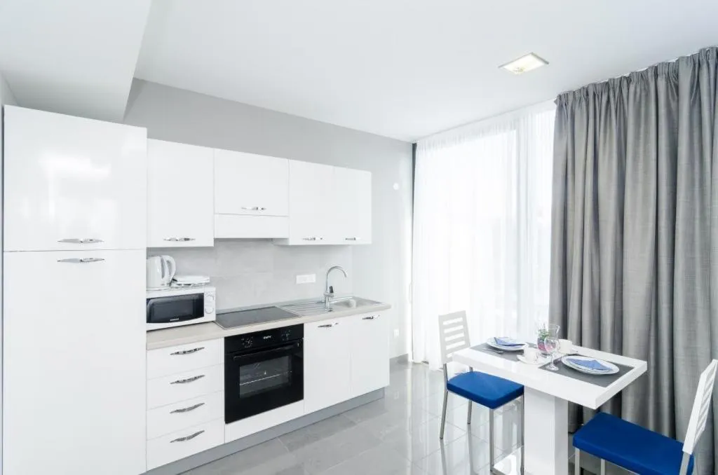 Kitchen or kitchenette in Apartments ZoomZoom