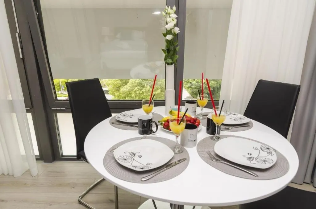 Dining area in Apartments ZoomZoom