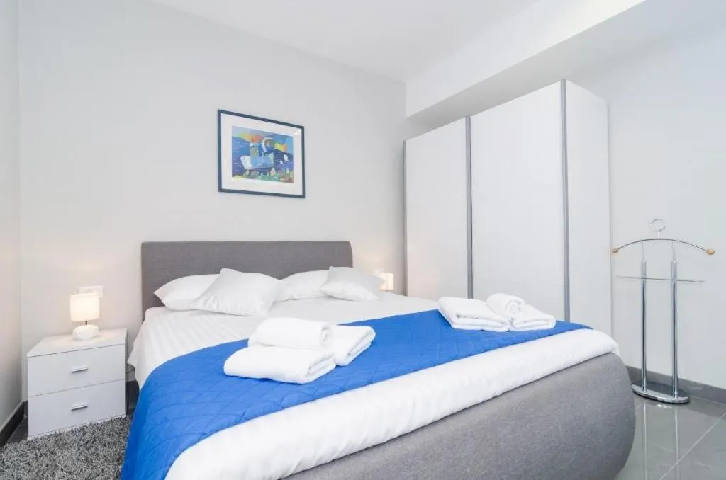 Bed in Apartments ZoomZoom