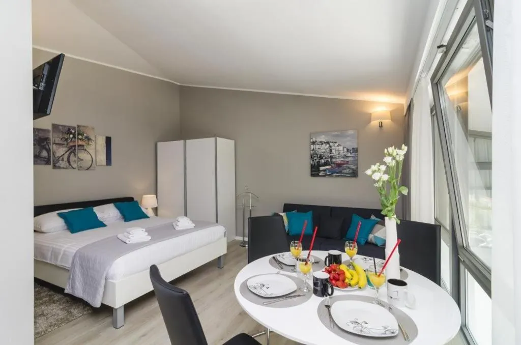 Living room, Bed in Apartments ZoomZoom