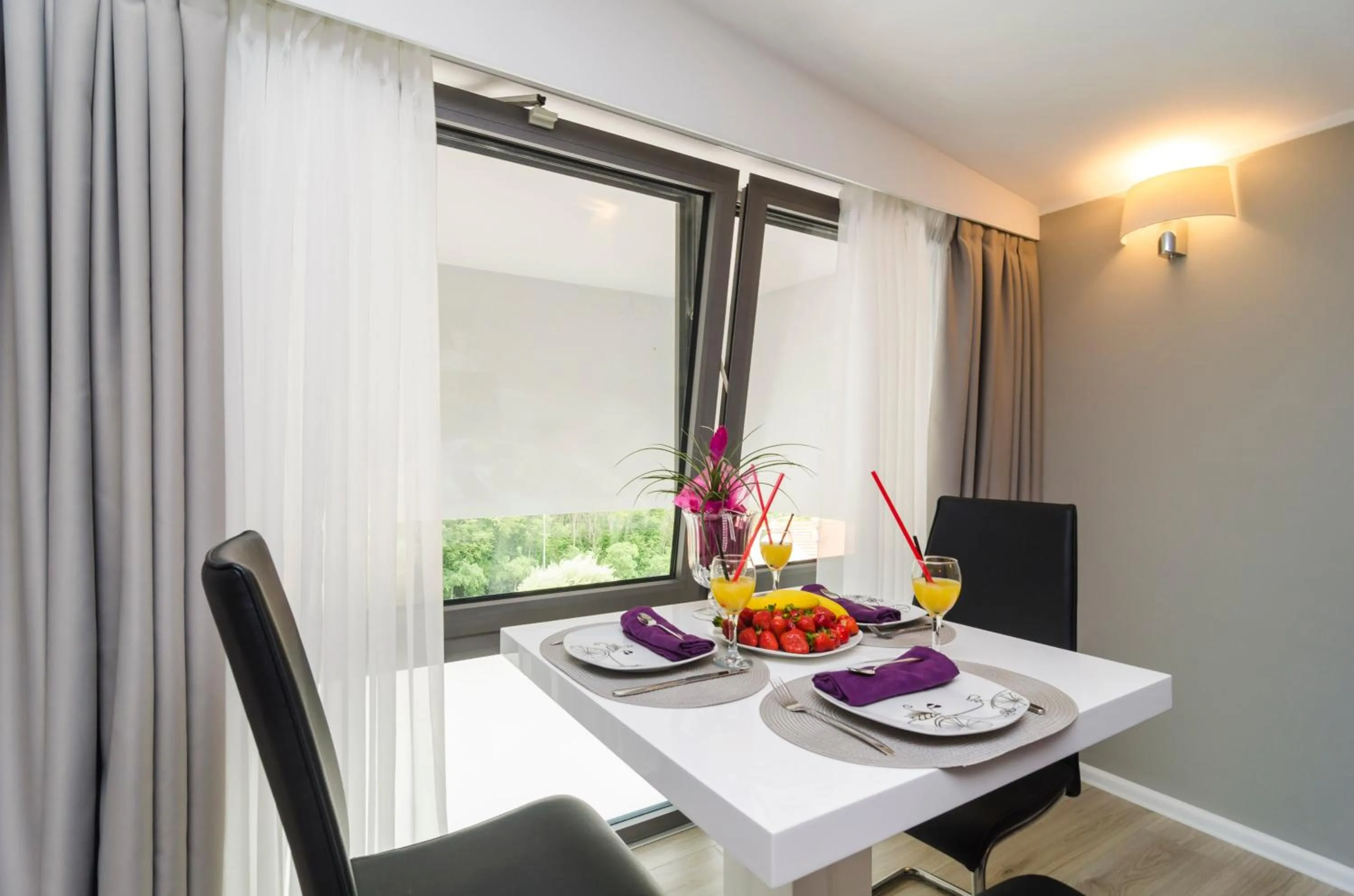 Dining area in Apartments ZoomZoom