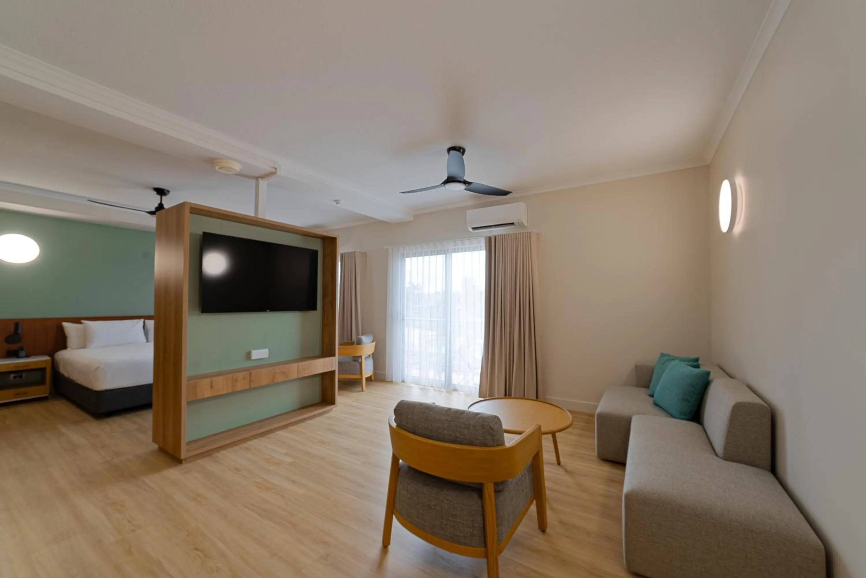 Seating area, Bed in Novotel Darwin Airport