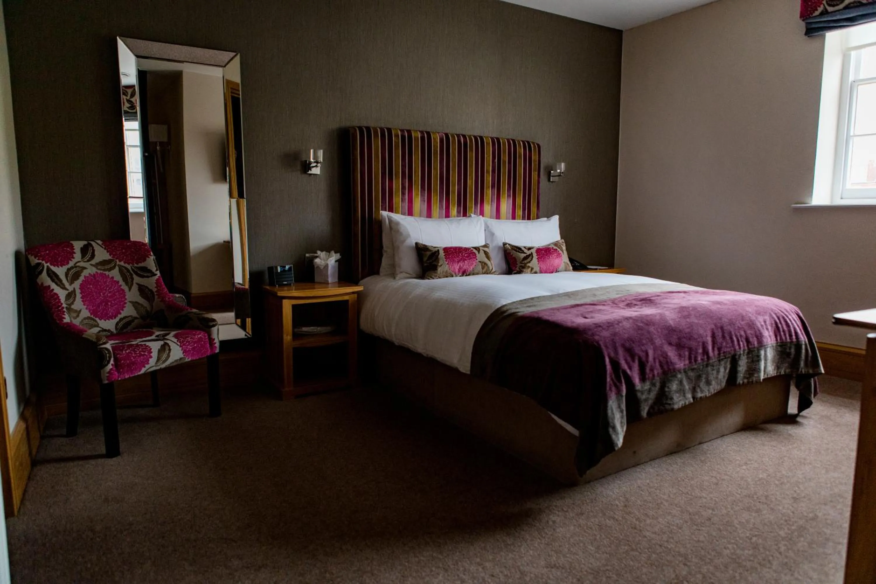 Bed in Ennios Boutique Hotel