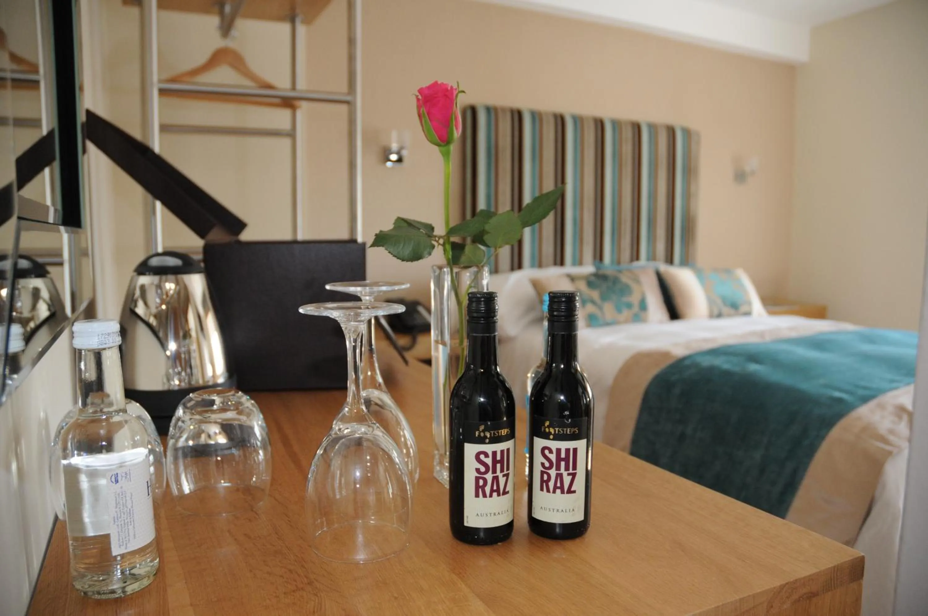 Bed in Ennios Boutique Hotel