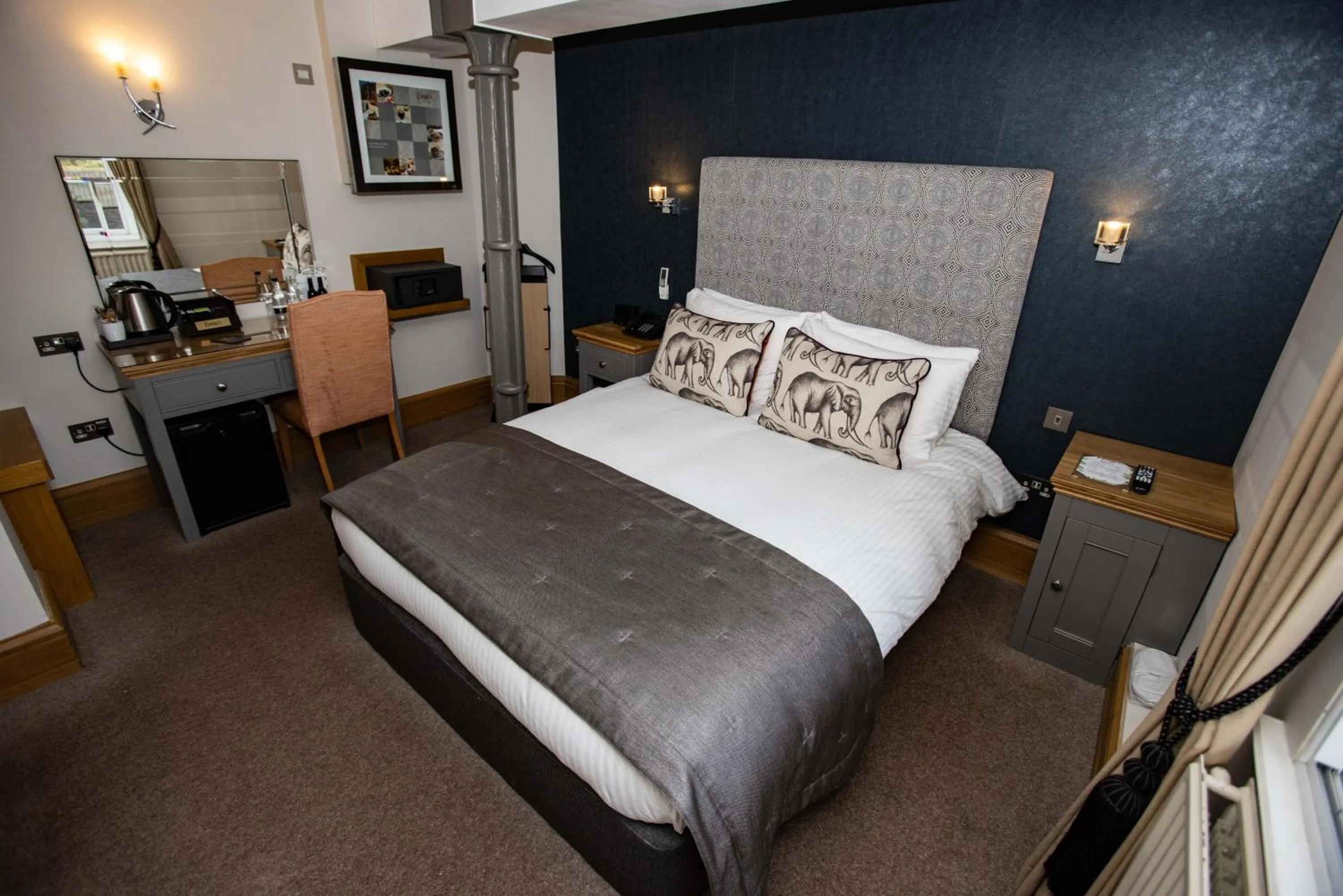 Bed in Ennios Boutique Hotel