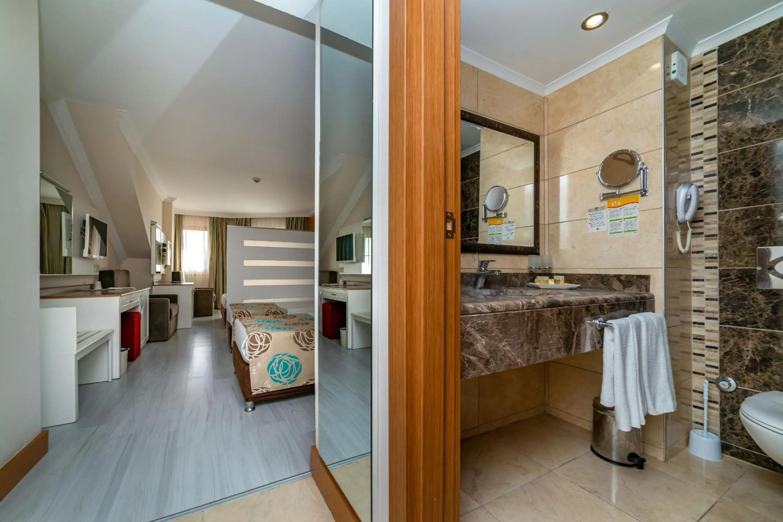 Toilet, Bed in Primasol Hane Family Resort Hotel