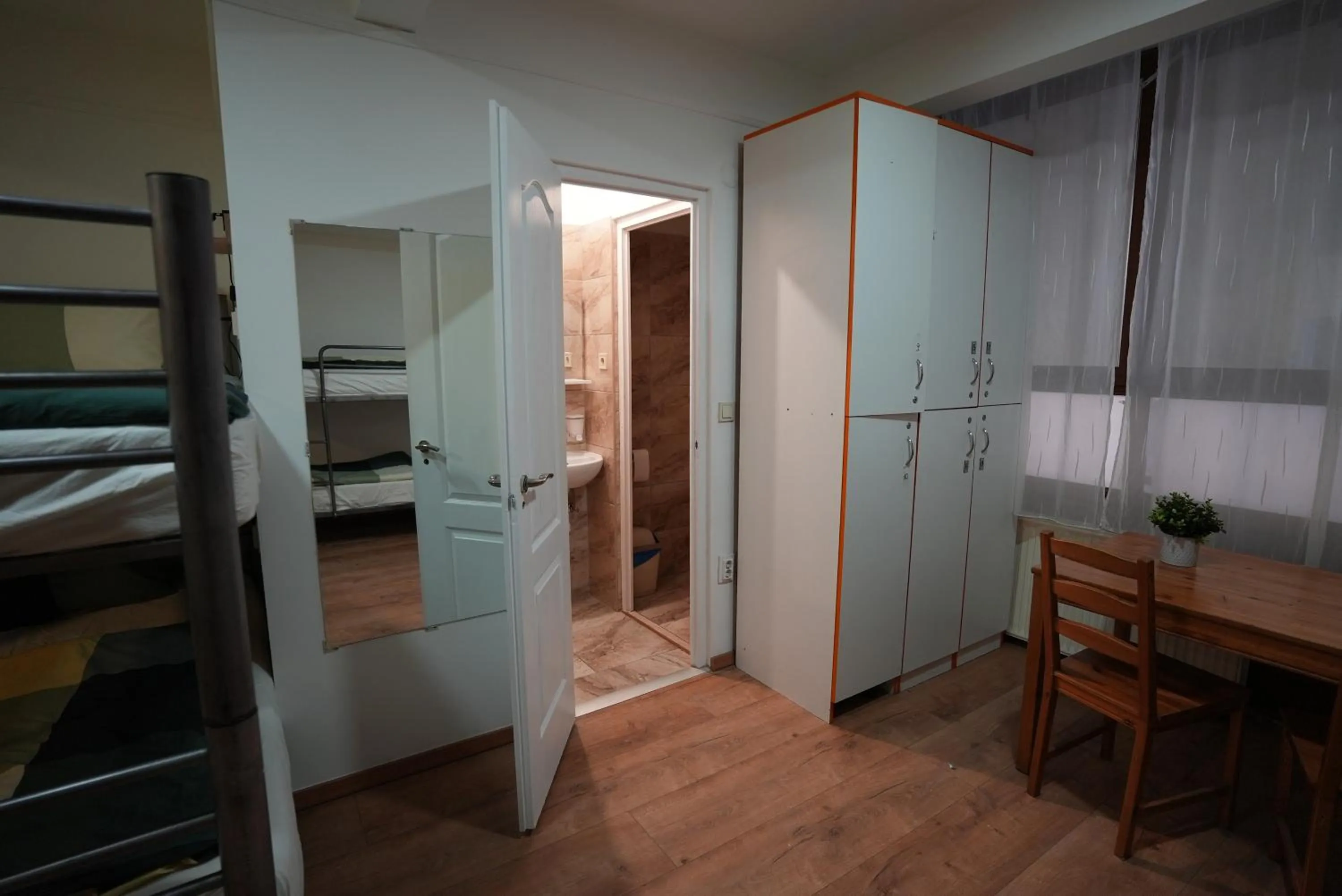 Shower, Bed in Center Hostel and Guest House