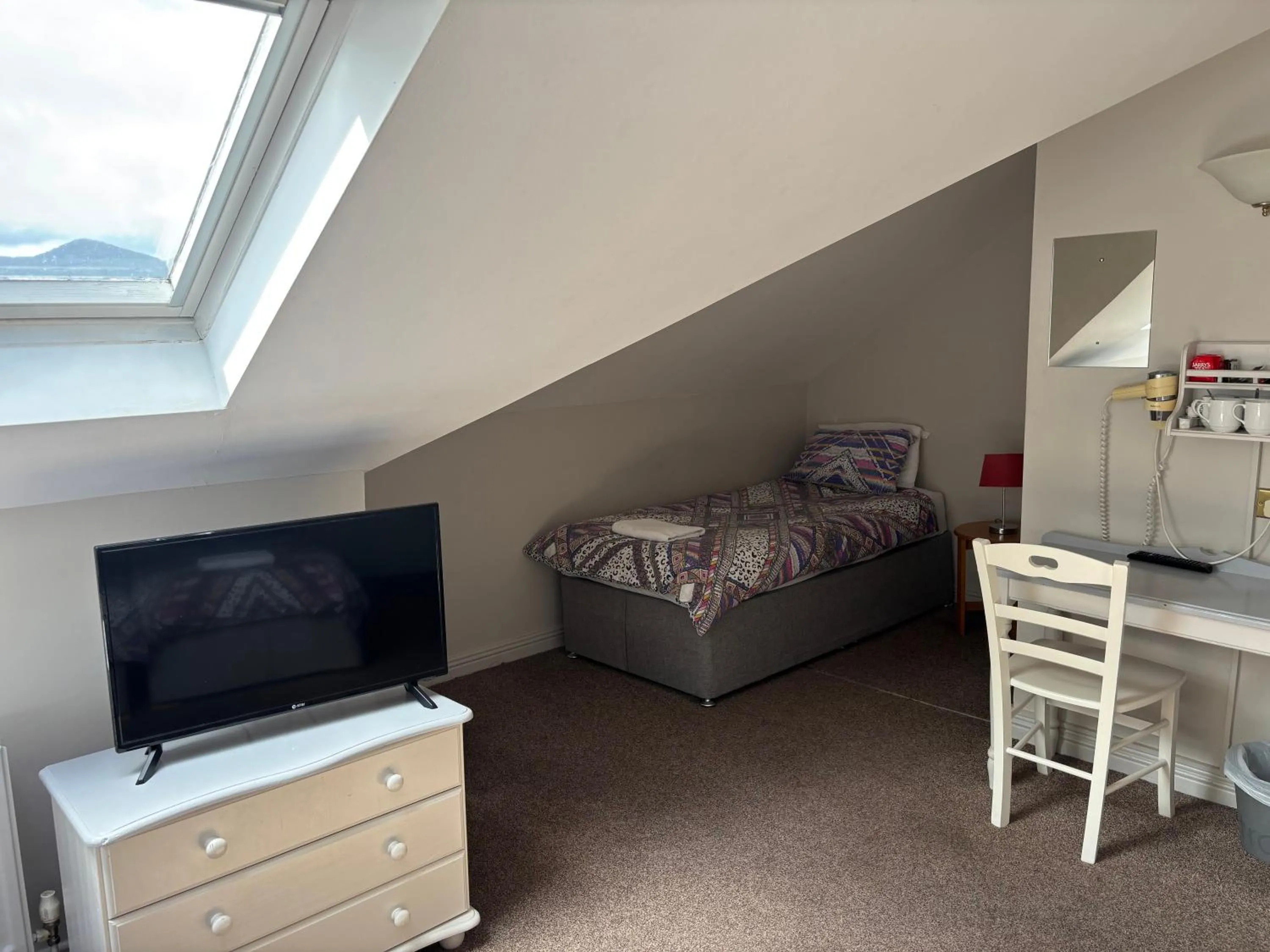 TV and multimedia in Harmony Inn - Glena House