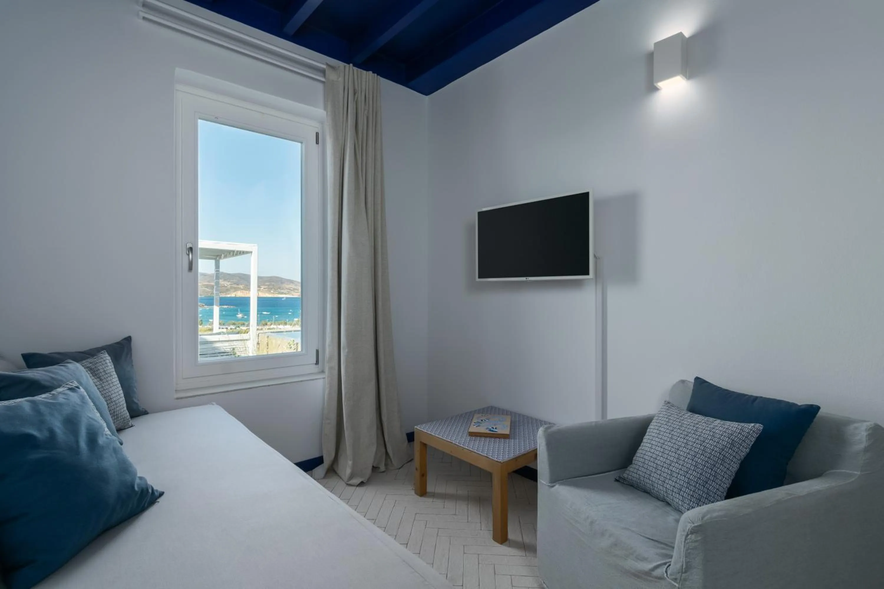 Living room, Bed in Milos Breeze Boutique Hotel