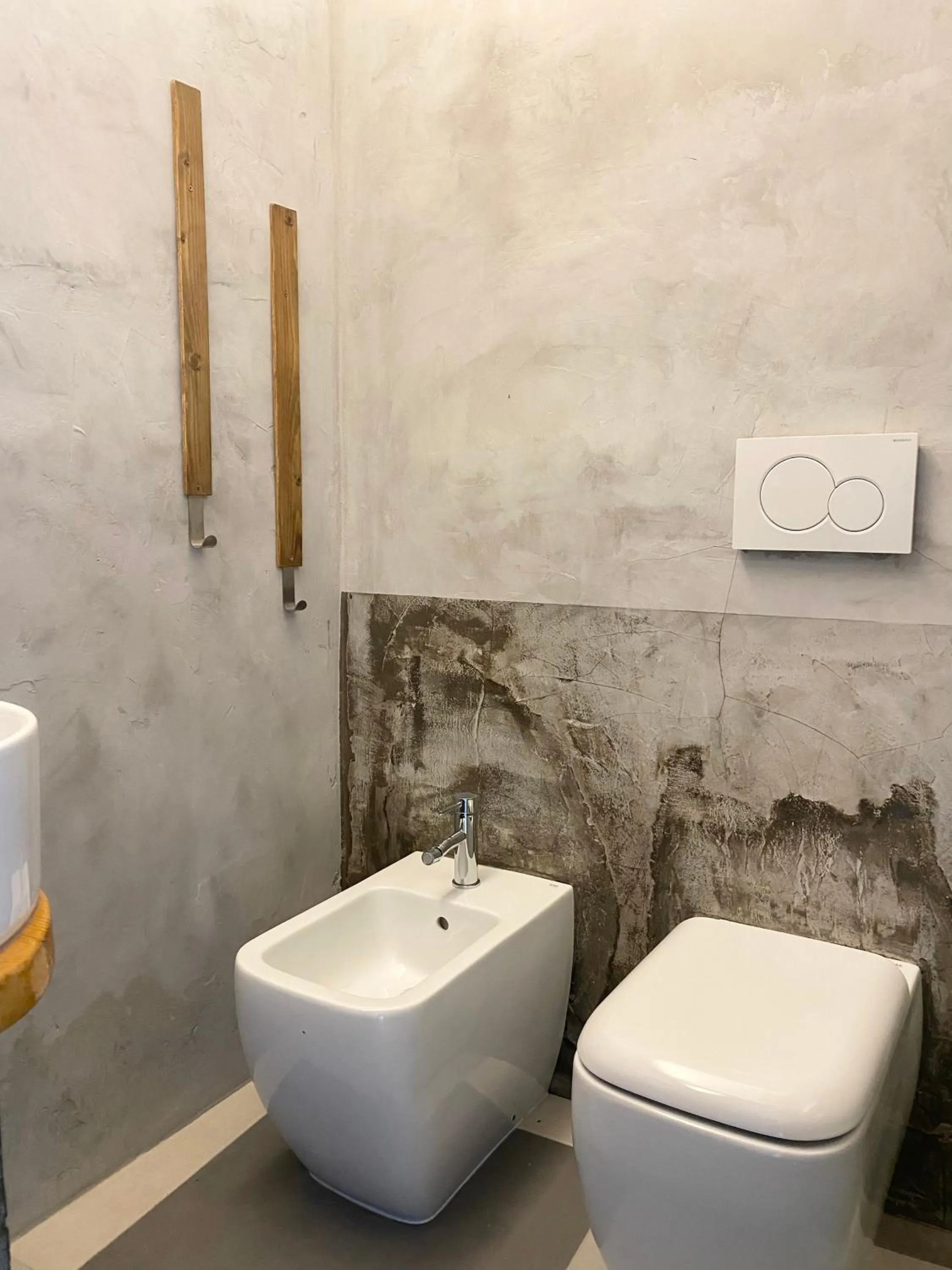 Toilet in Black Market Hotel