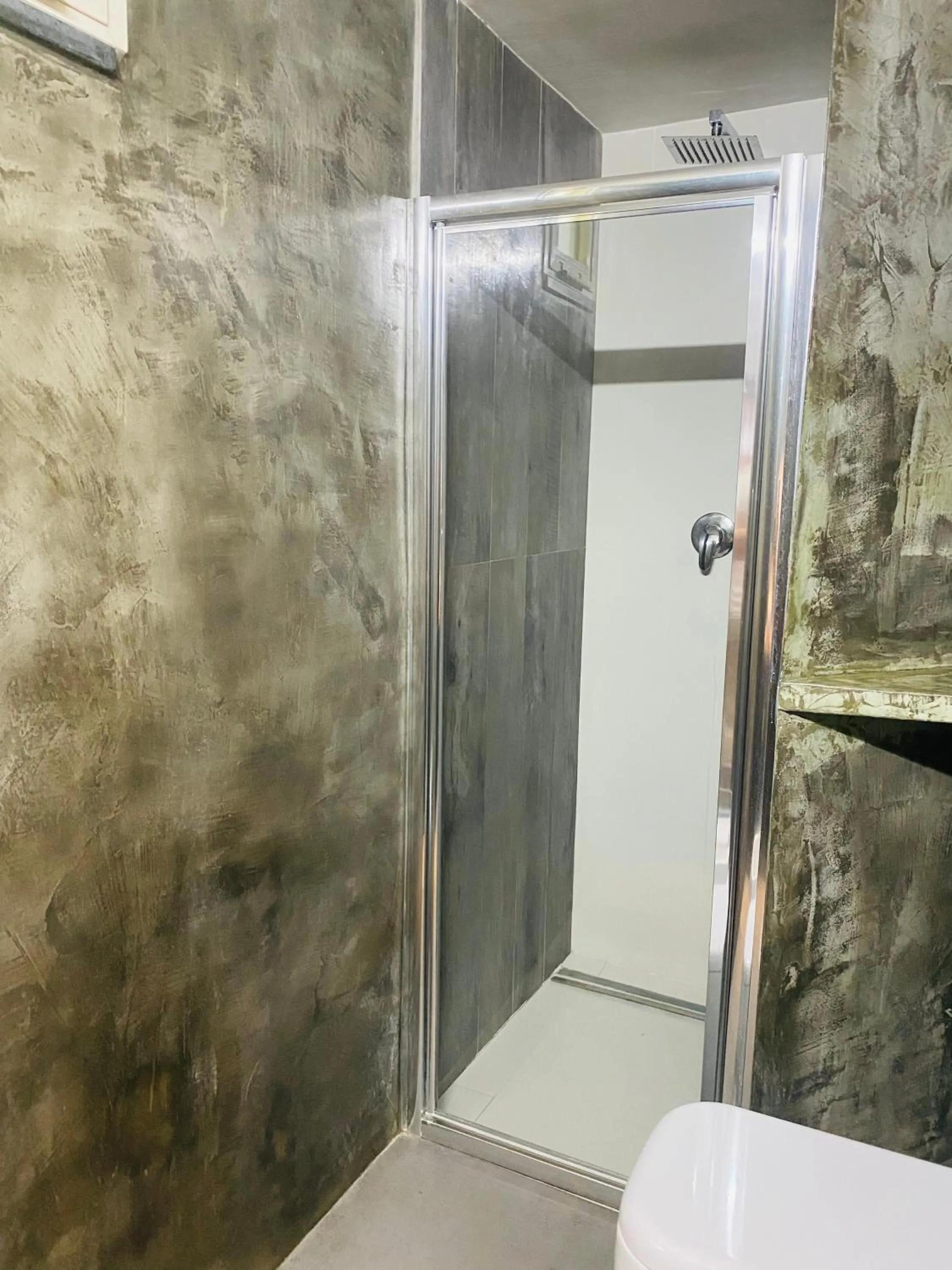 Shower in Black Market Hotel