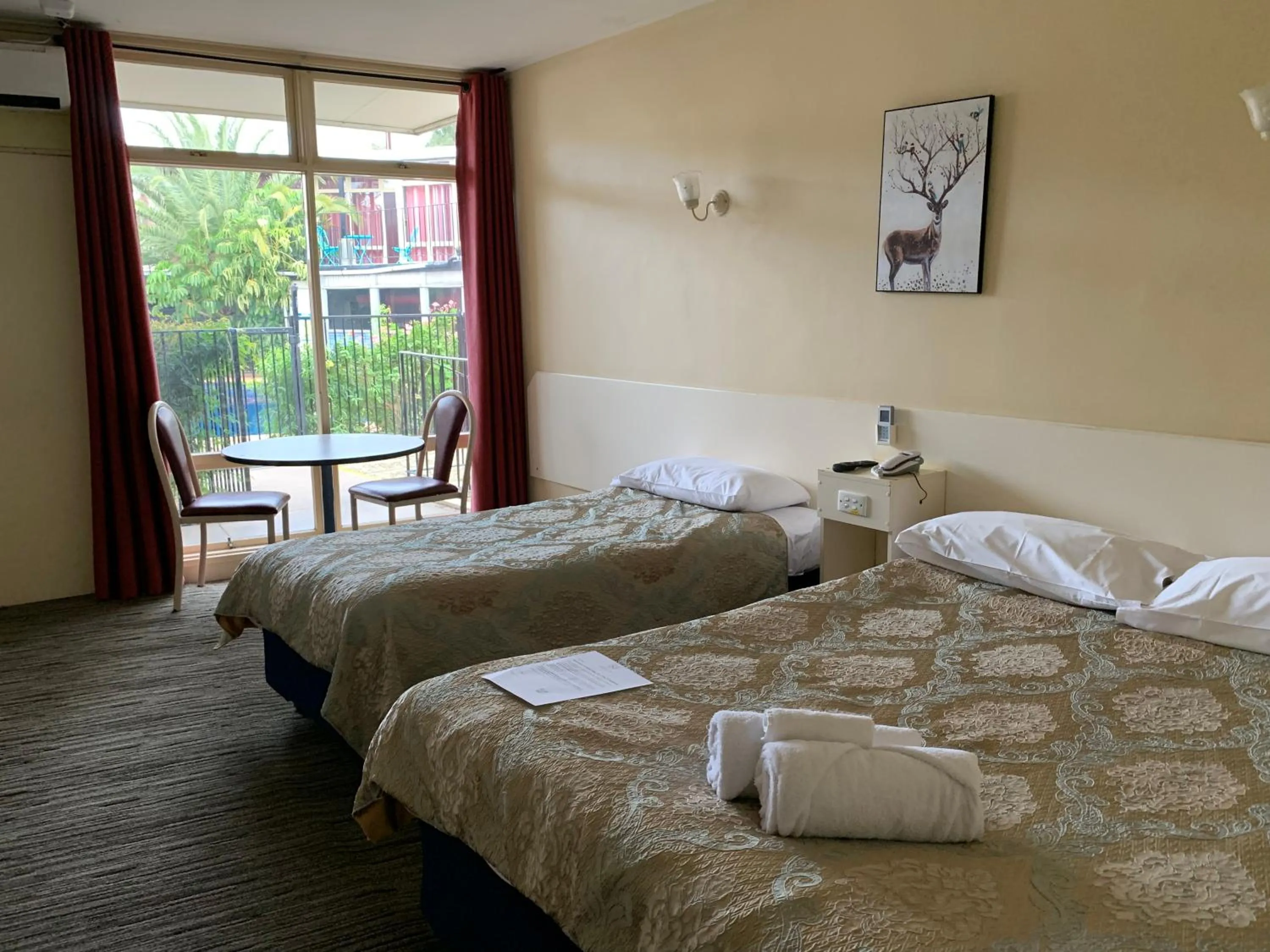 Bed in Jacksons Motor Inn