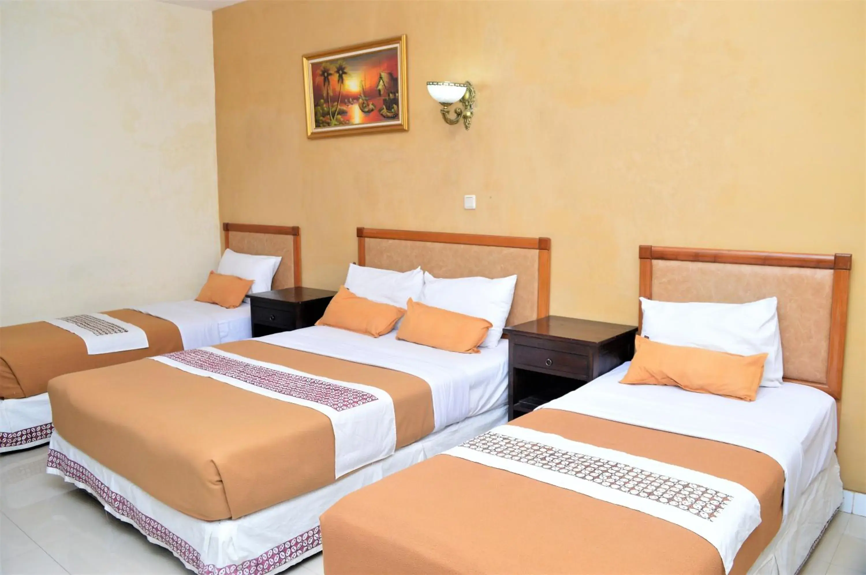 Standard Quadruple Room in Hotel Mataram 2 Malioboro Standard Quadruple Room in Hotel Mataram 2 Malioboro