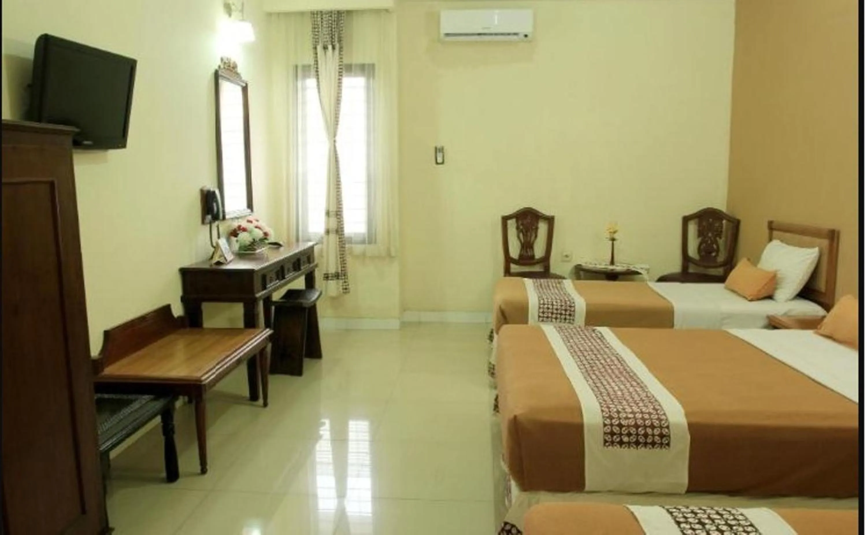 Photo of the whole room, Bed in Hotel Mataram 2 Malioboro