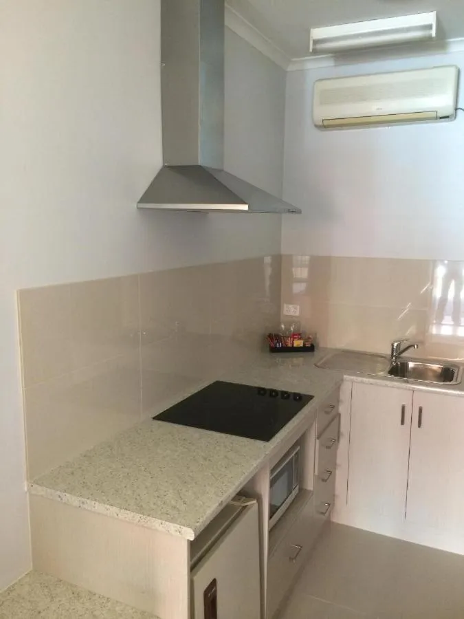 Kitchen or kitchenette in Footscray Motor Inn and Serviced Apartments