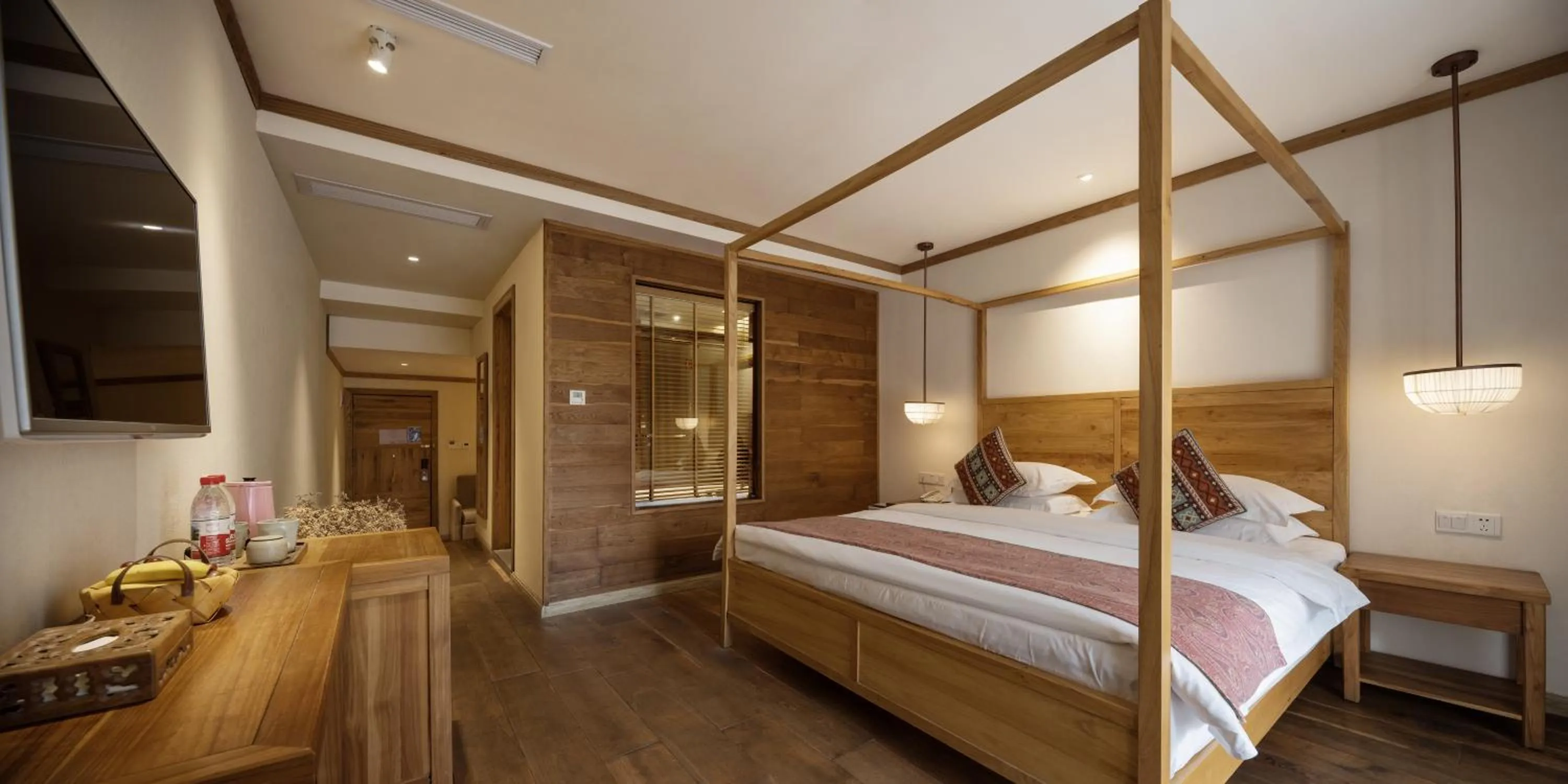 Bed in Yangshuo The Apsara Lodge