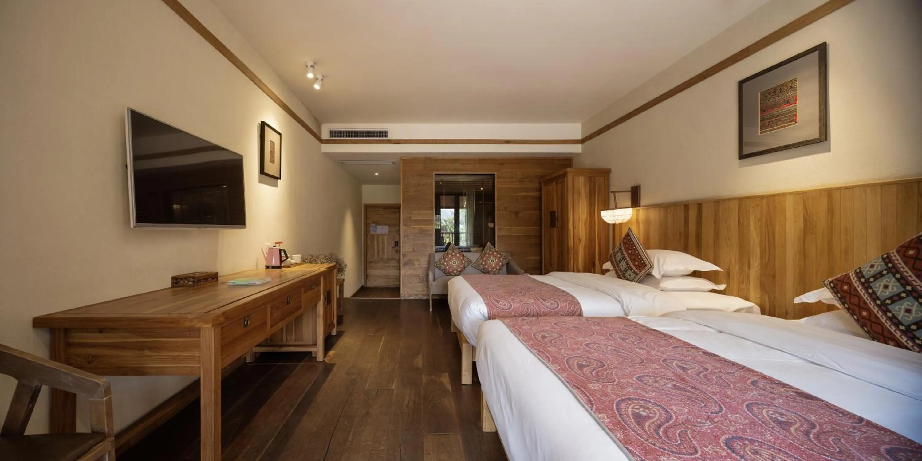 Bed in Yangshuo The Apsara Lodge