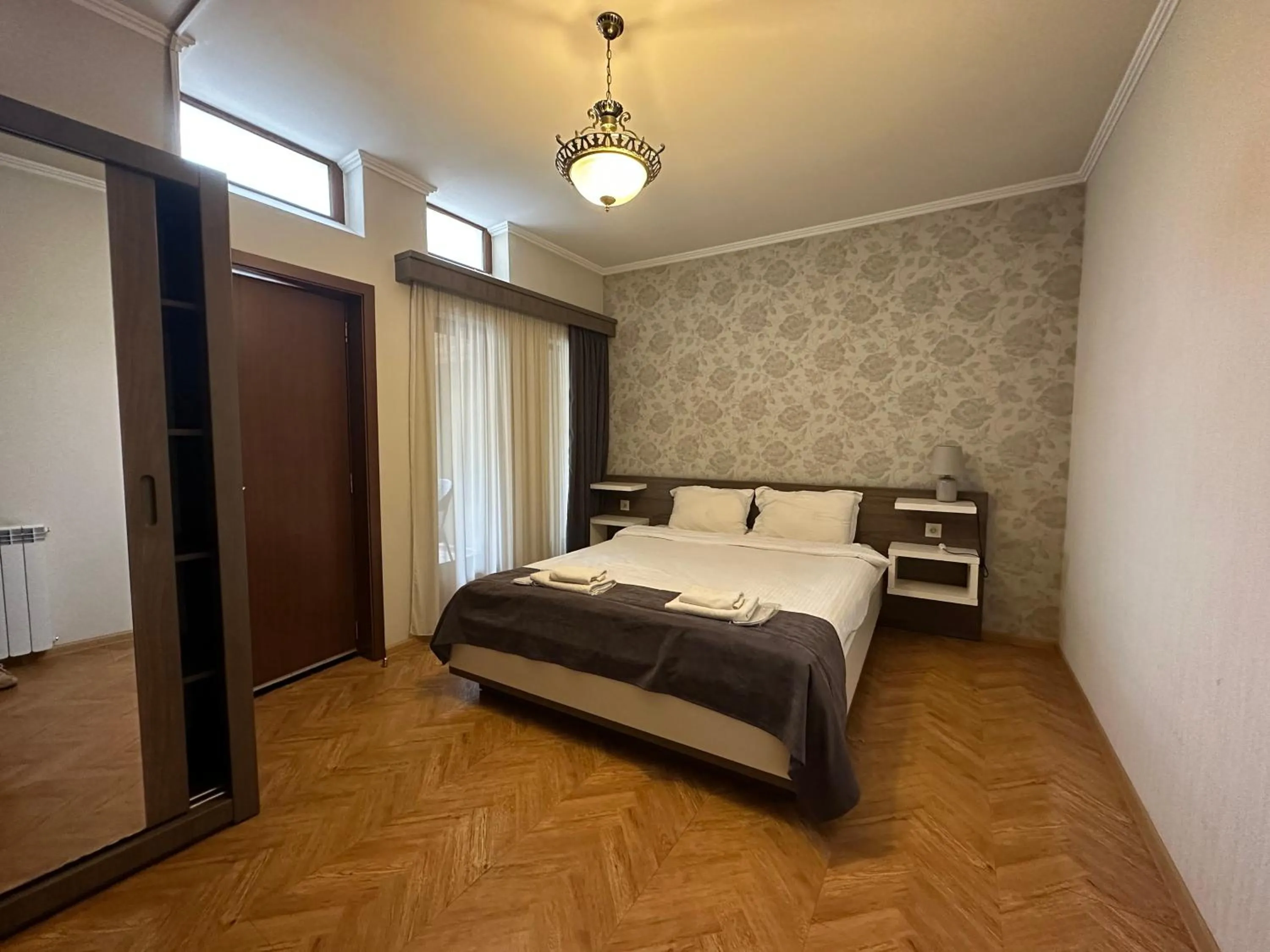 wardrobe, Bed in Hotel Four Brothers