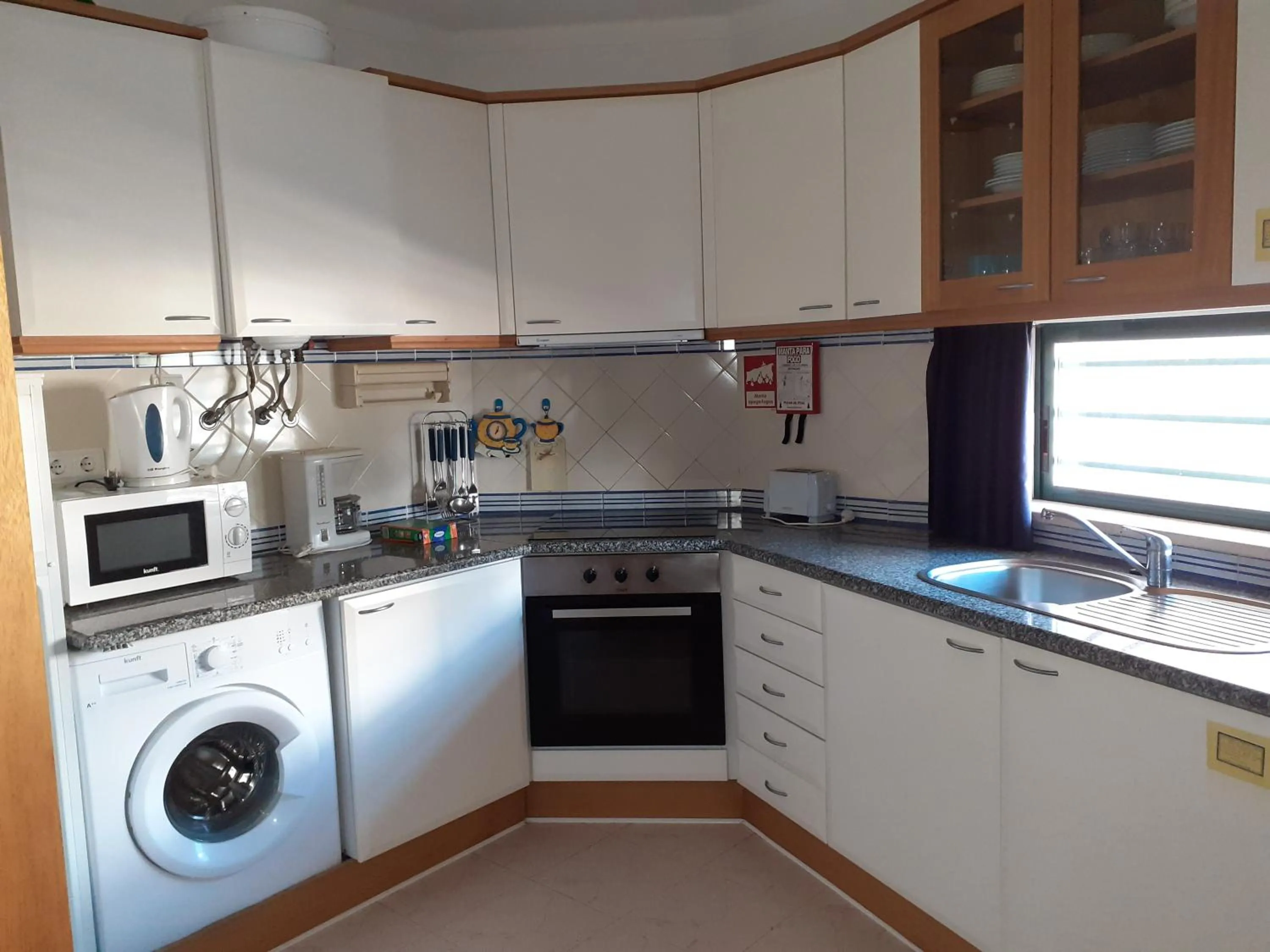 Kitchen or kitchenette in Clube Meia Praia