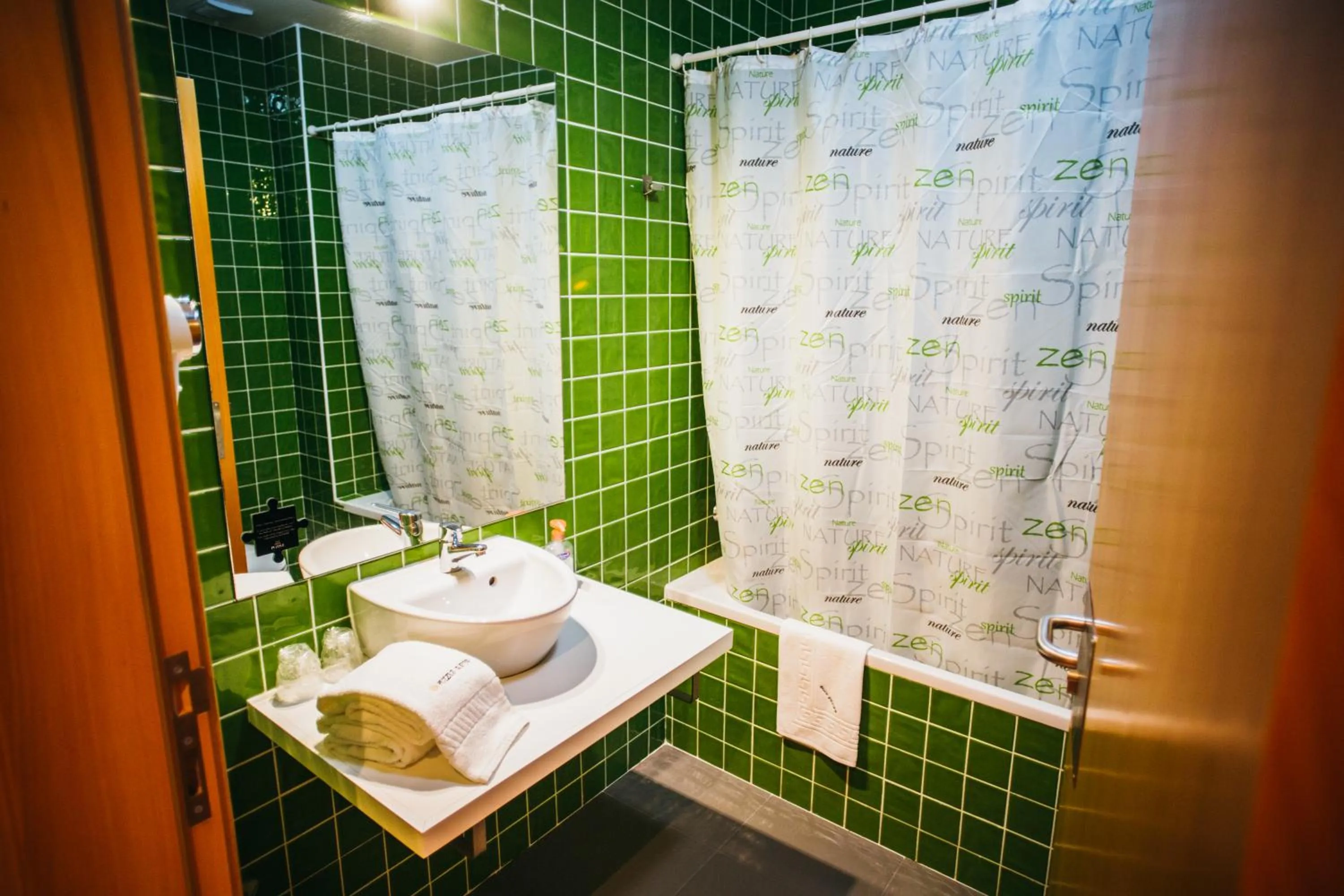 Bathroom in Puzzle Suites B&B