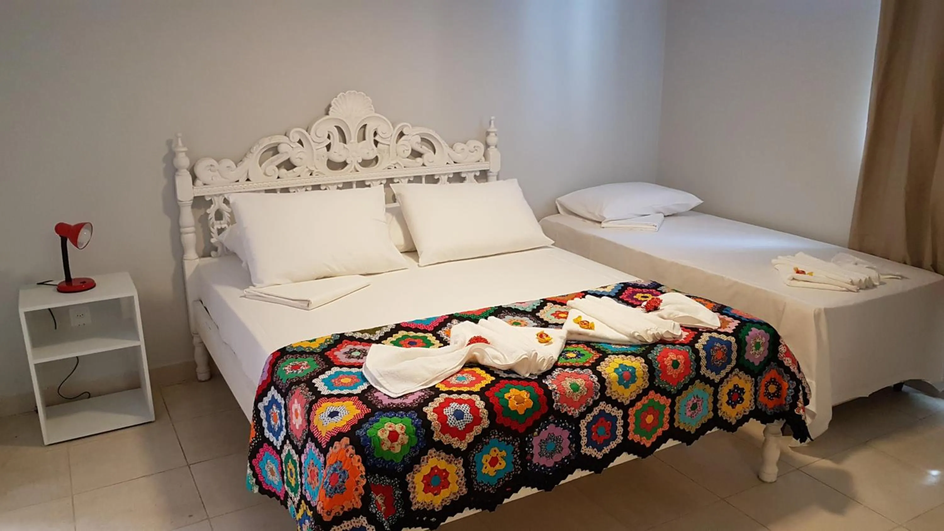 Bed in Pousada das Bromélias