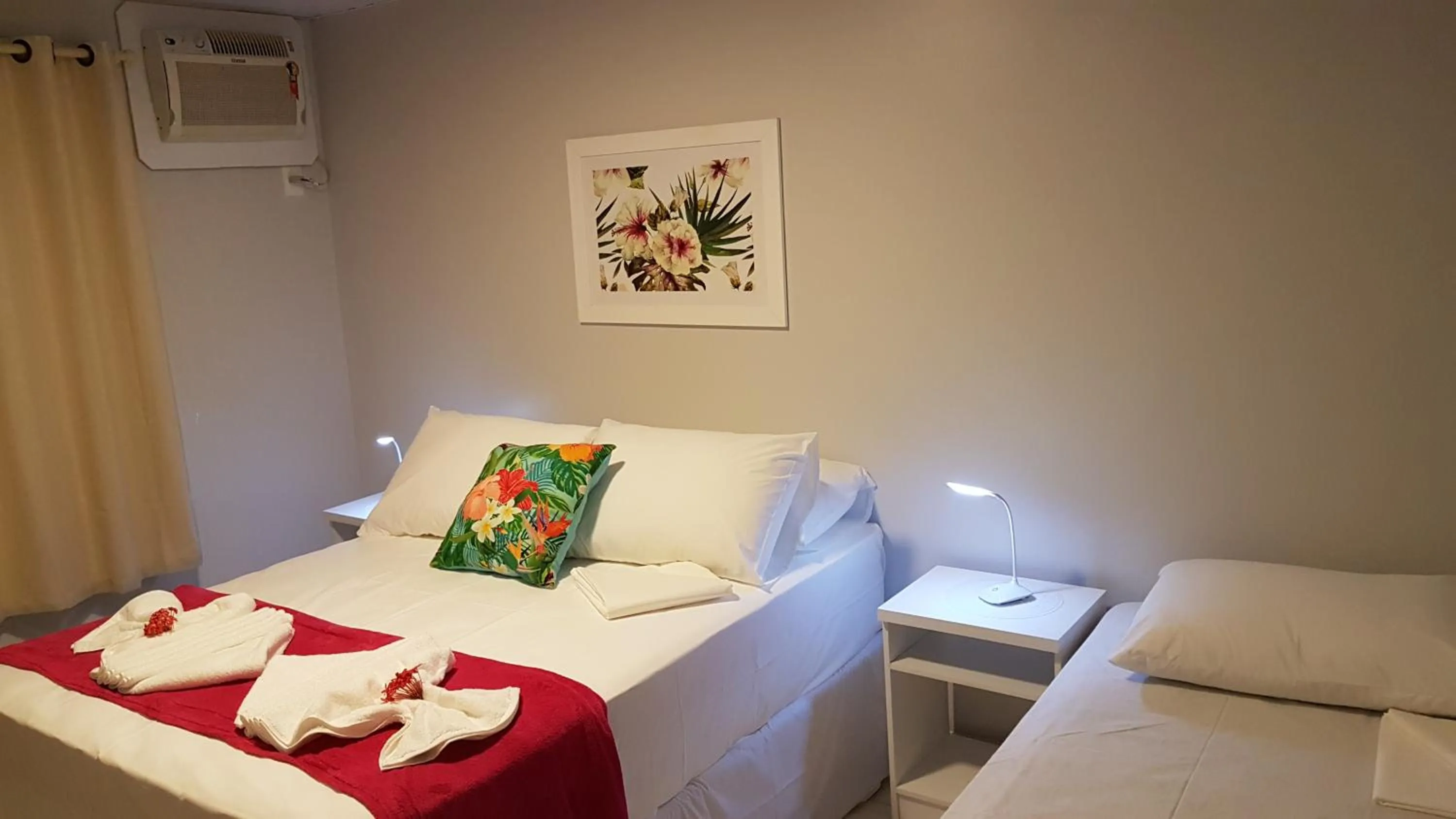 Bed in Pousada das Bromélias