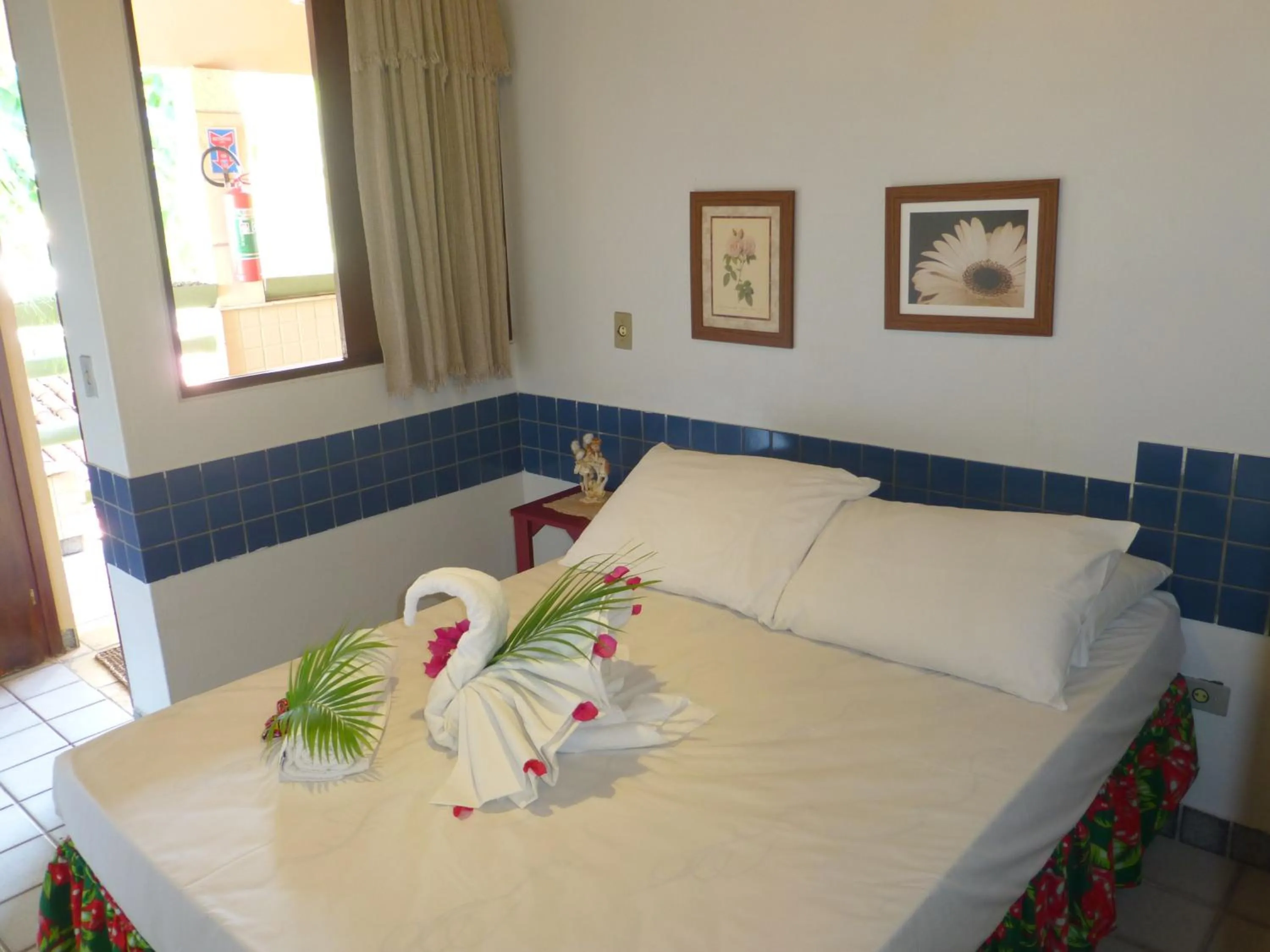 Bed in Pousada das Bromélias