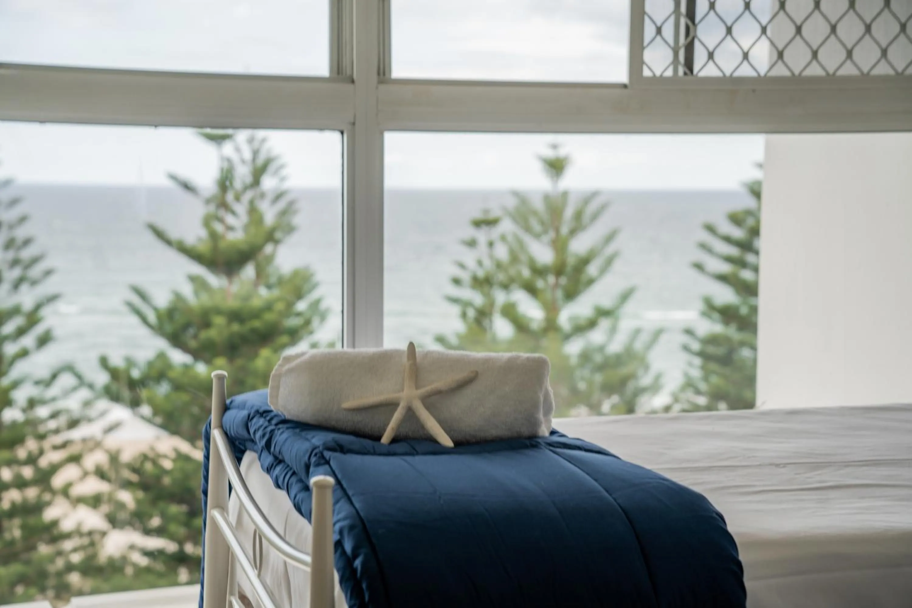 Bed in Cashelmara Beachfront Apartments