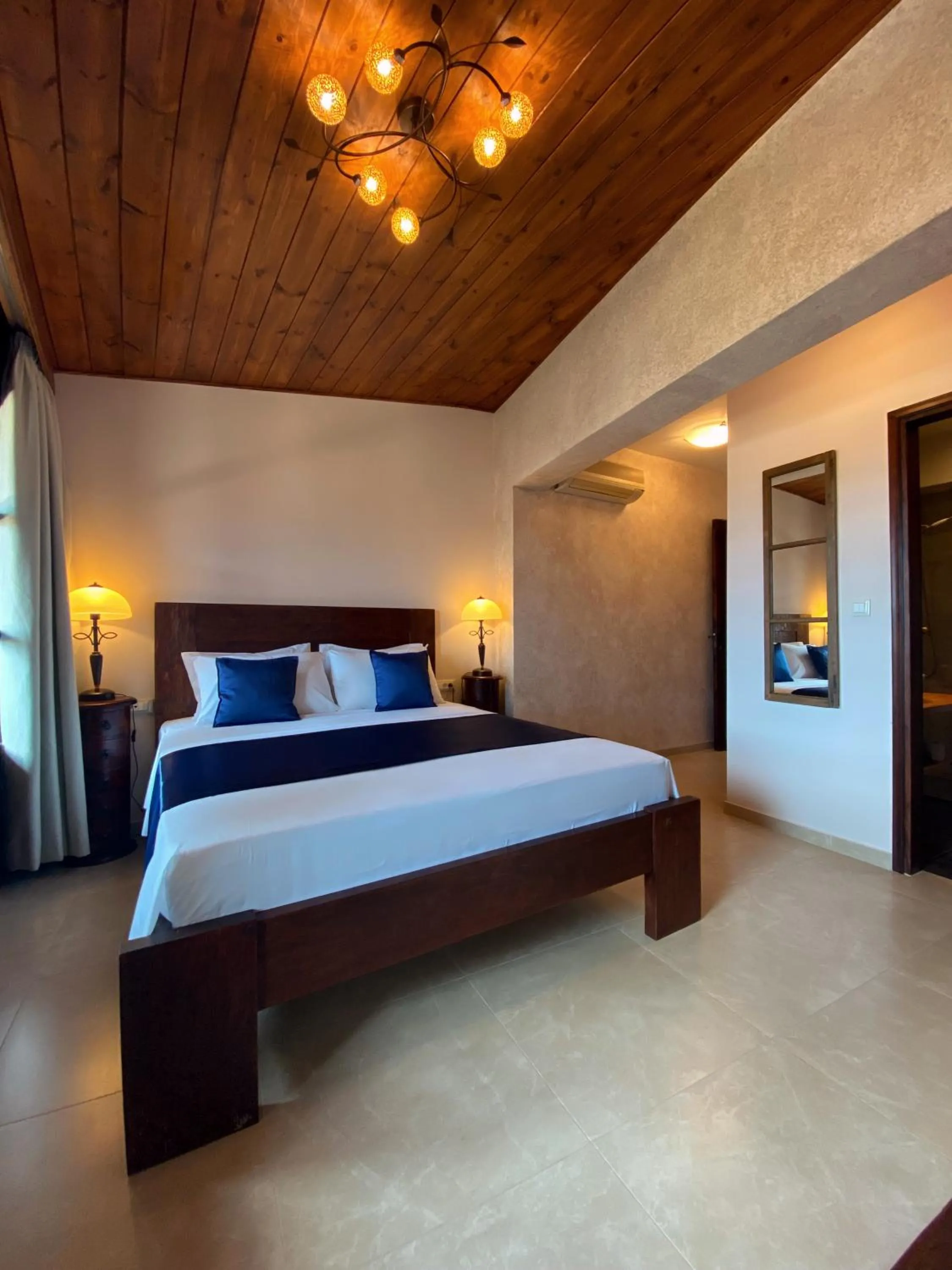 Bed in S.Nikolis' Historic Boutique Hotel