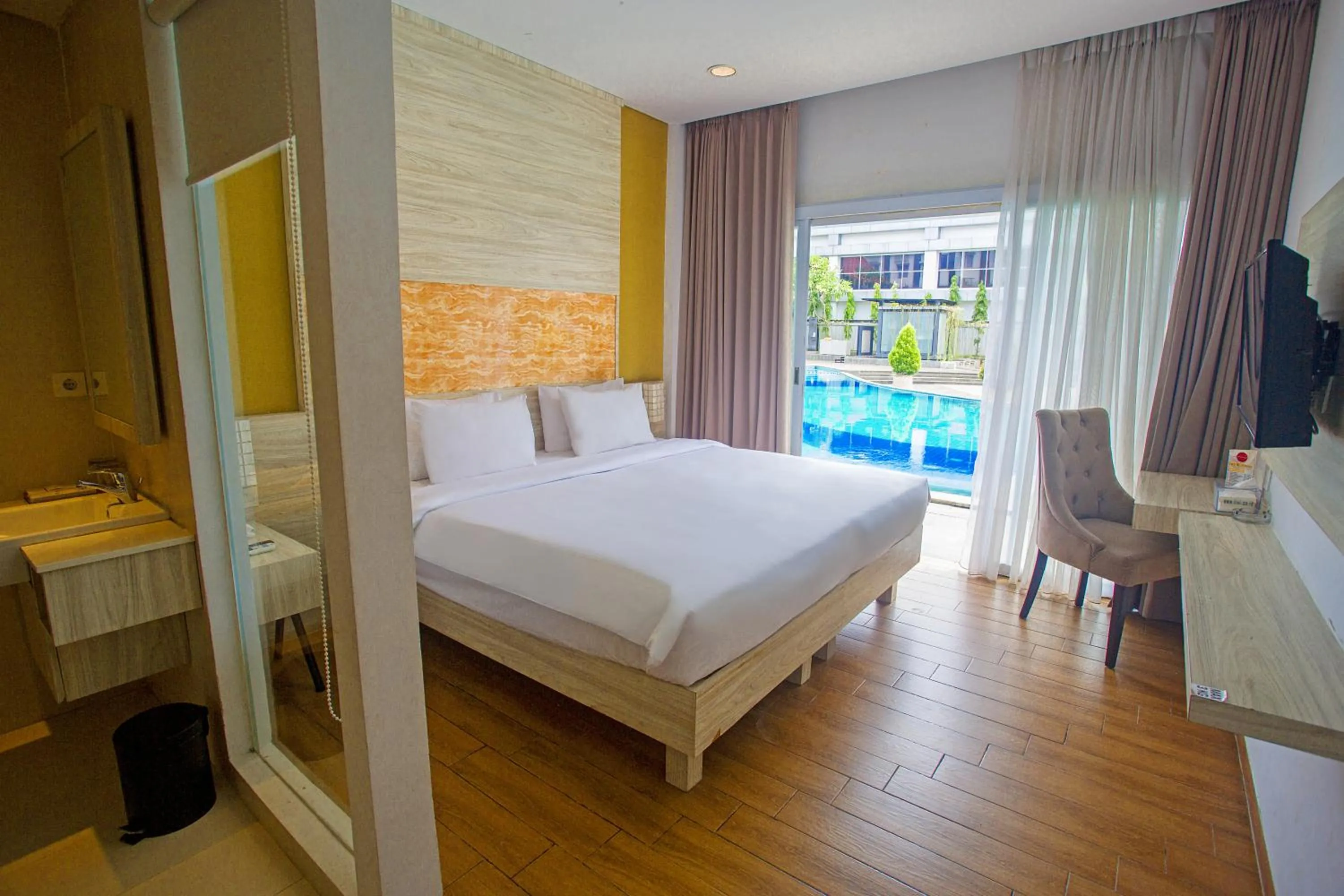 Bedroom, Bed in Front One Akshaya Hotel Karawang