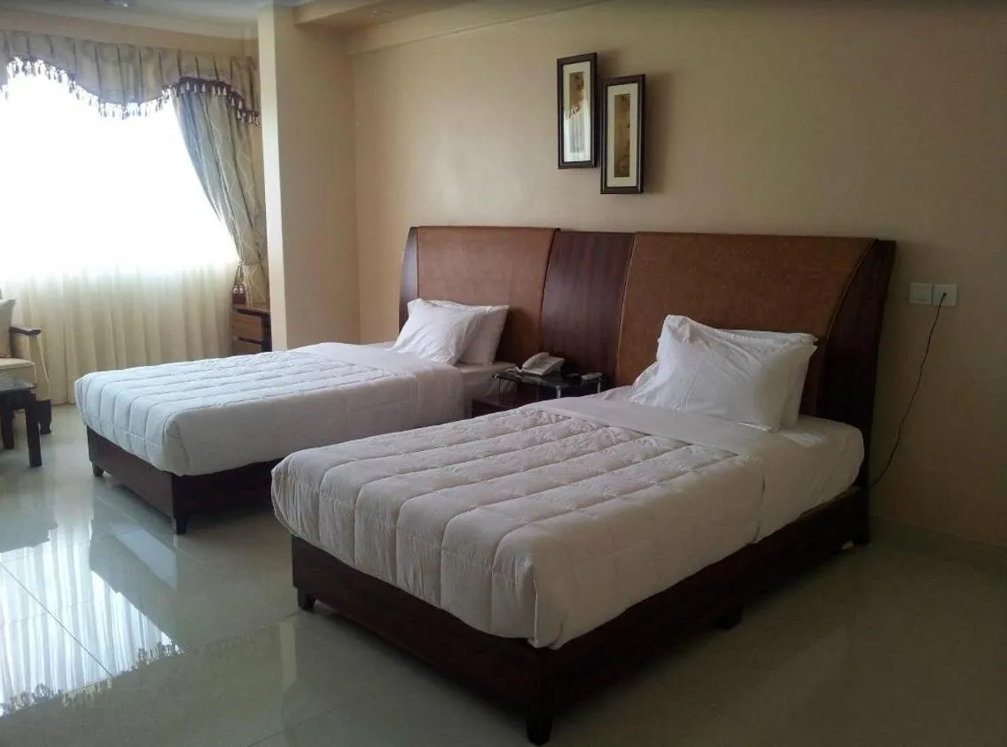 Bed in Imperial Golf View Hotel