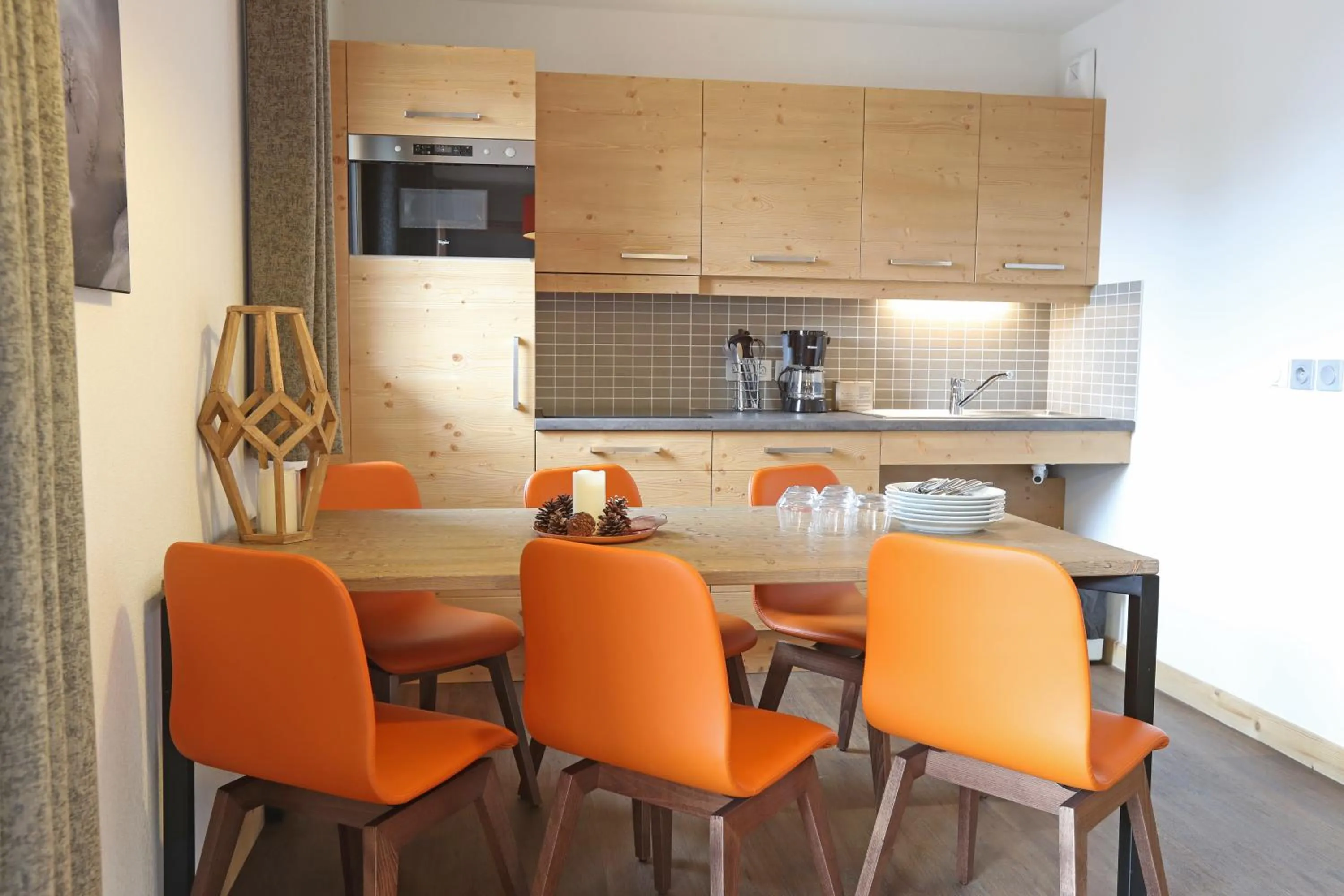 Kitchen or kitchenette in Résidence Club mmv Le Cœur des Loges ****